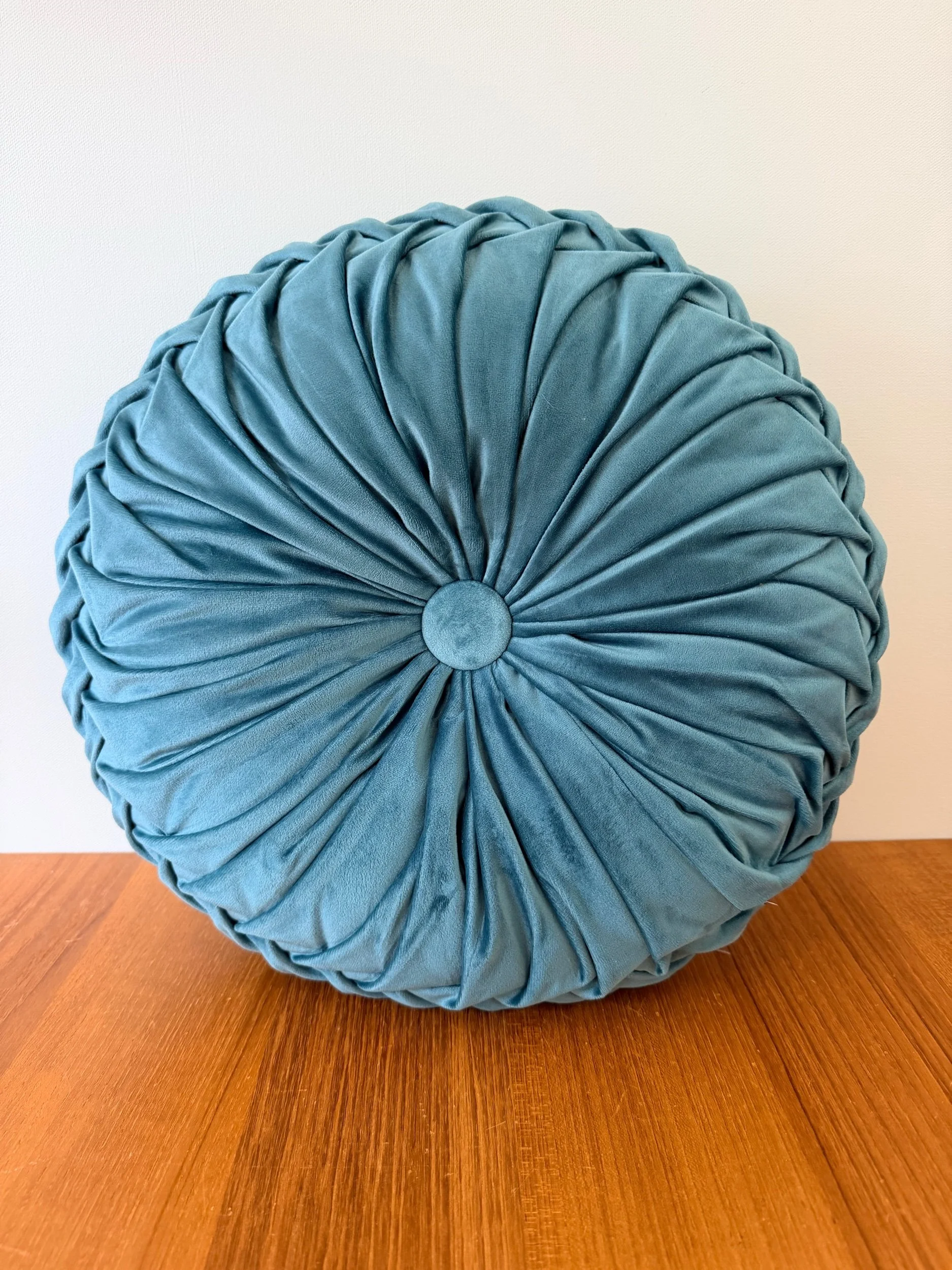 round velvet teal pillow