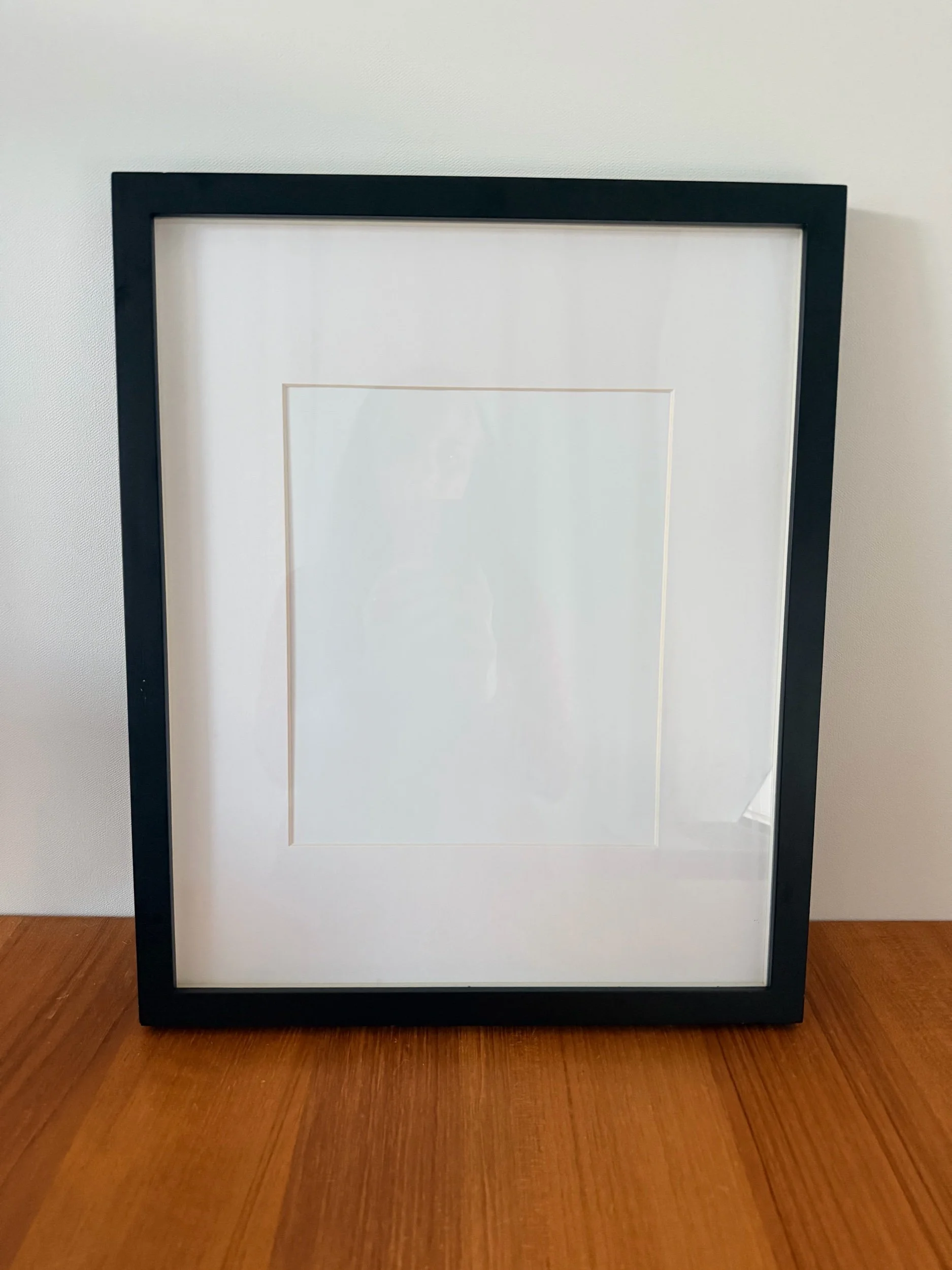 black pottery barn frame with mat