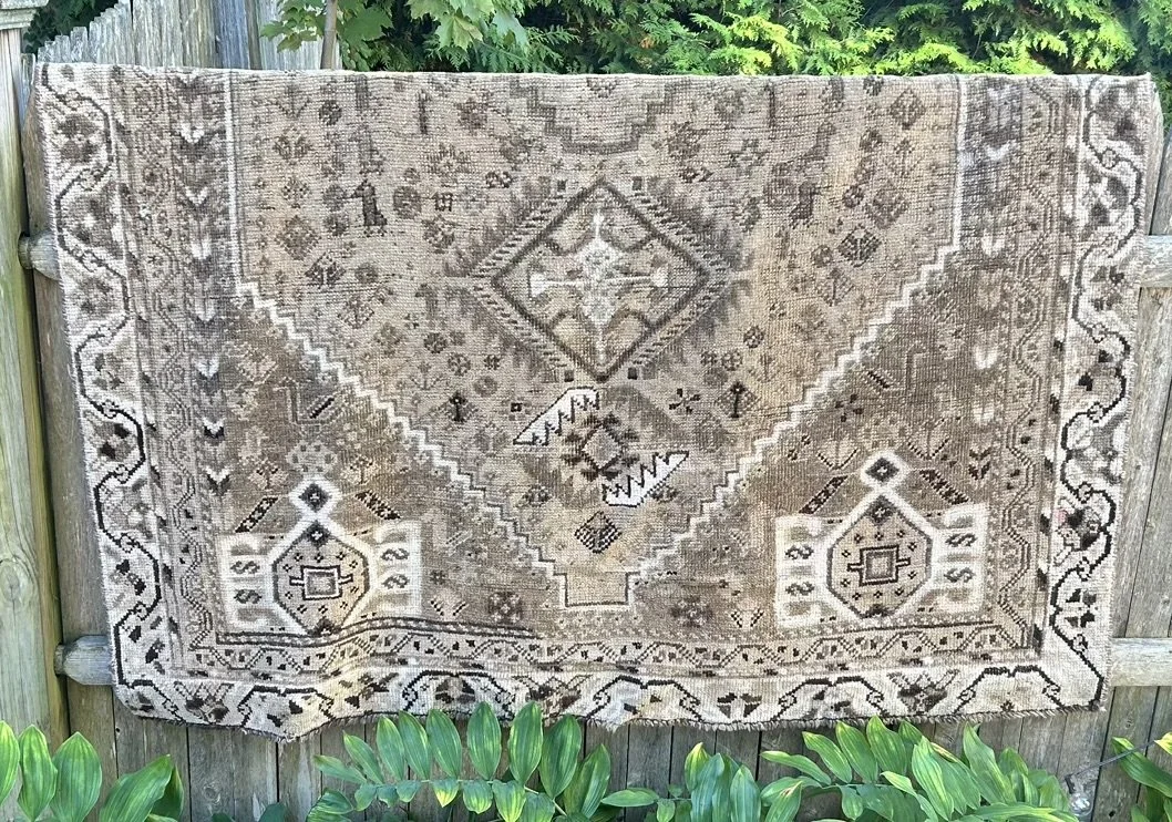 5' x 8' brown vintage Iranian rug