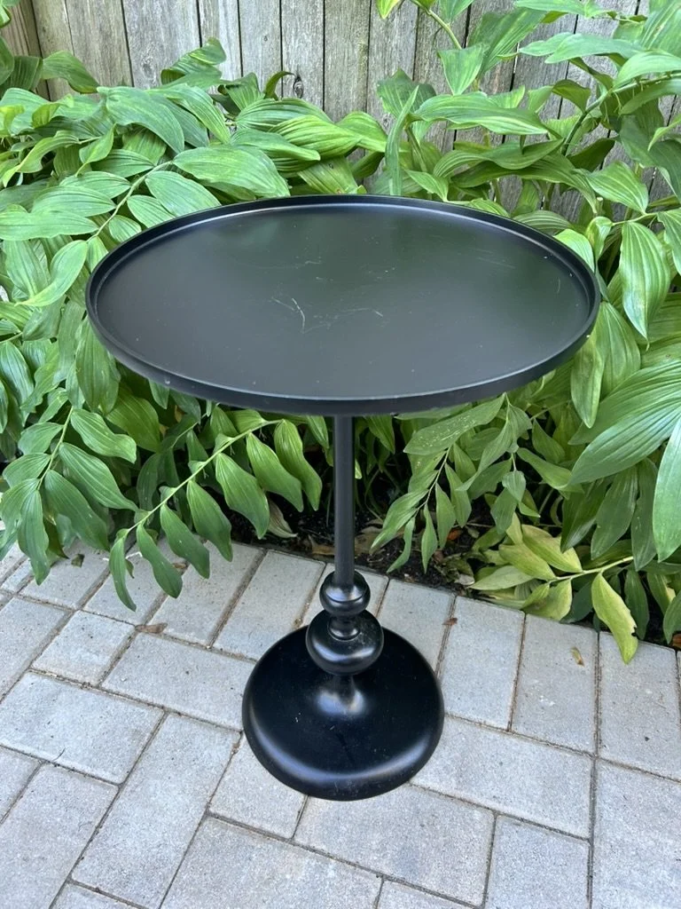 round black metal side table