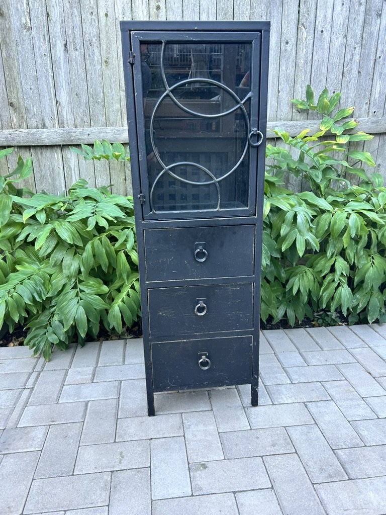 tall black metal cabinet