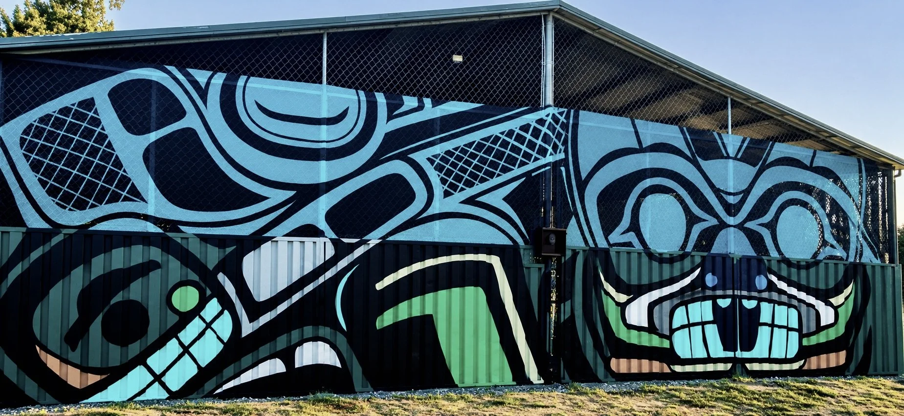 Vibrant Indigenous-Inspired Orca Mural Shelter.jpeg