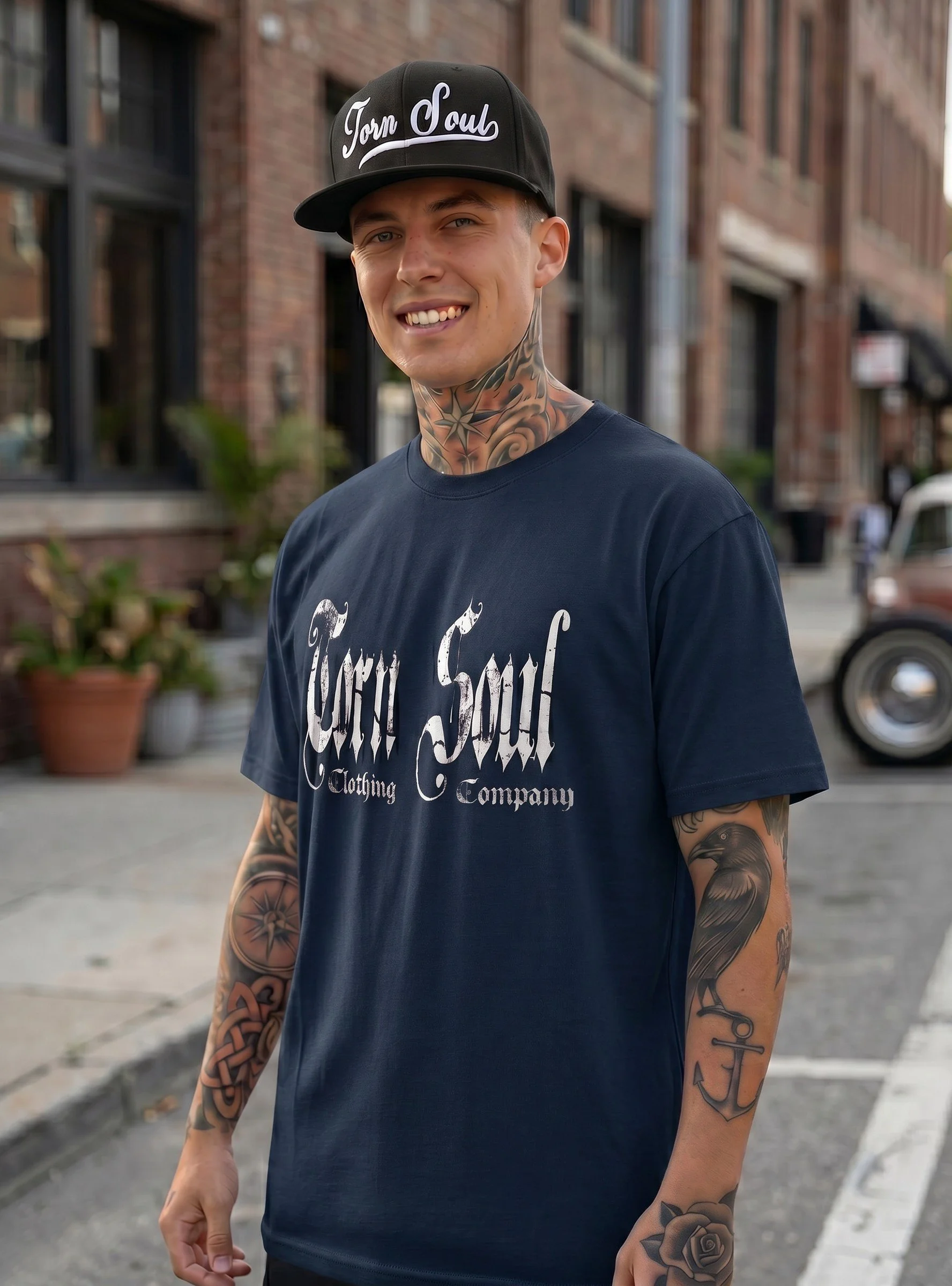 TORN IN TWO TEE
