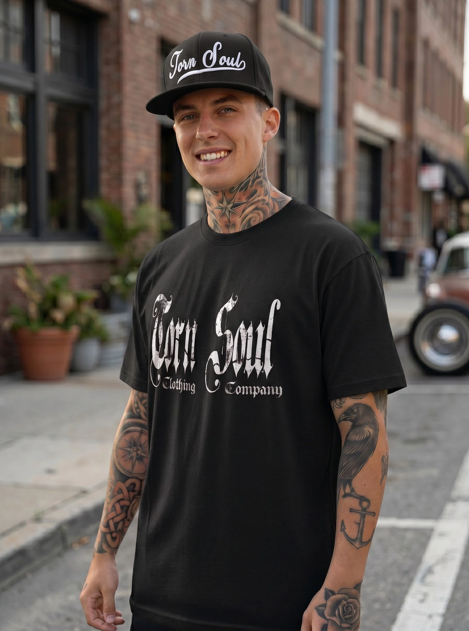 TORN IN TWO TEE