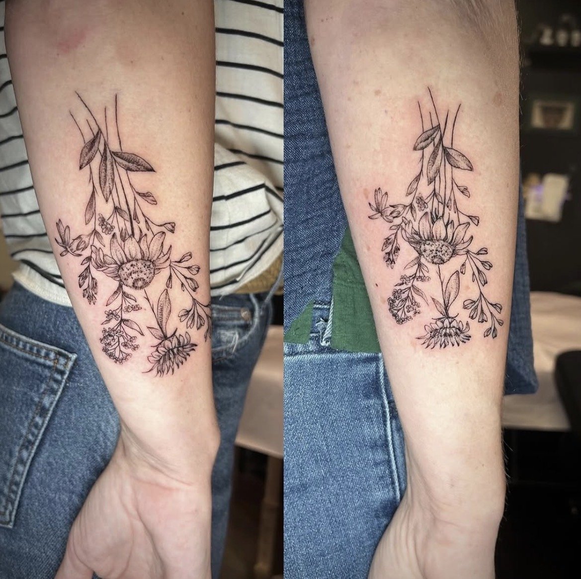 Black outline floral tattoo on forearm with flowers, leaves, and stems.