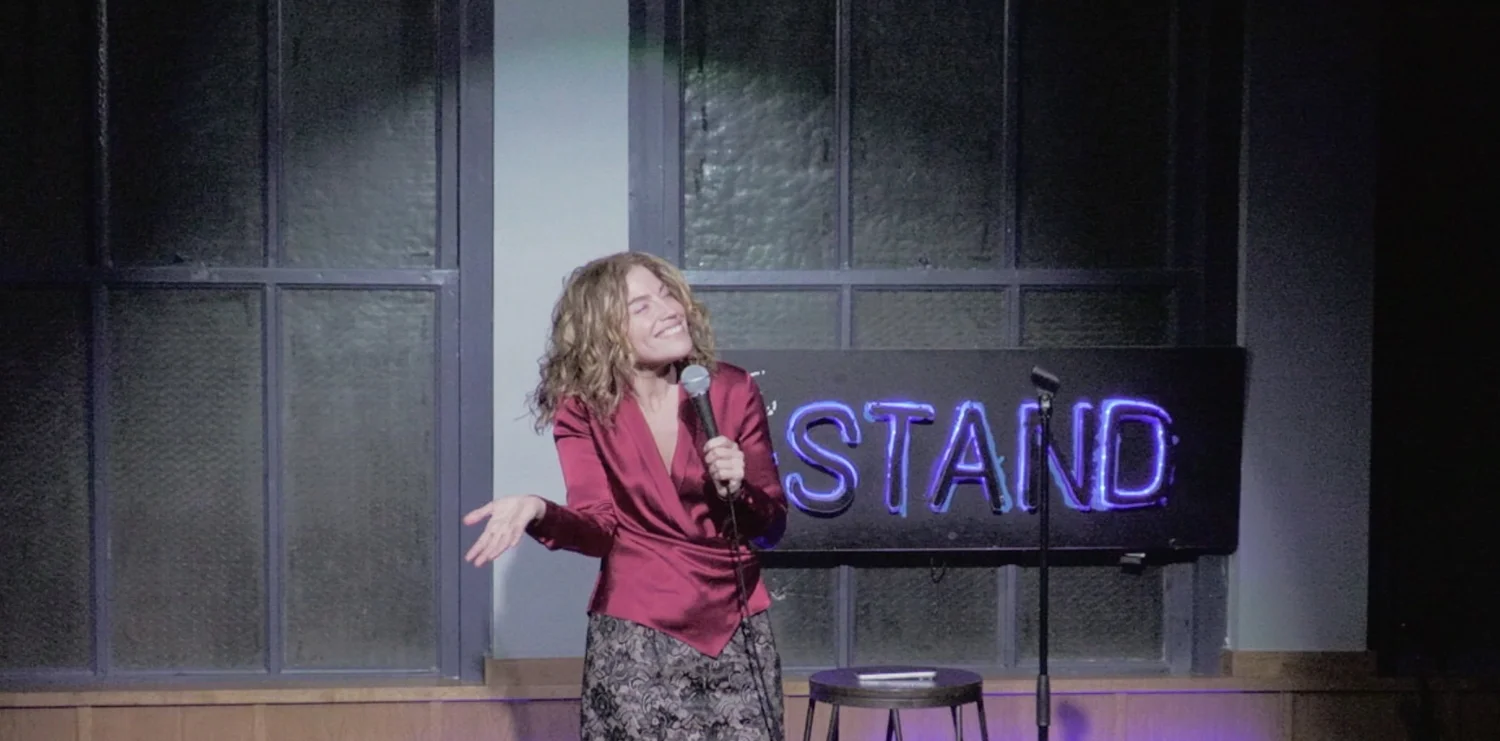 Dana Marisa Schoenfeld performing stand-up at The Stand, New York