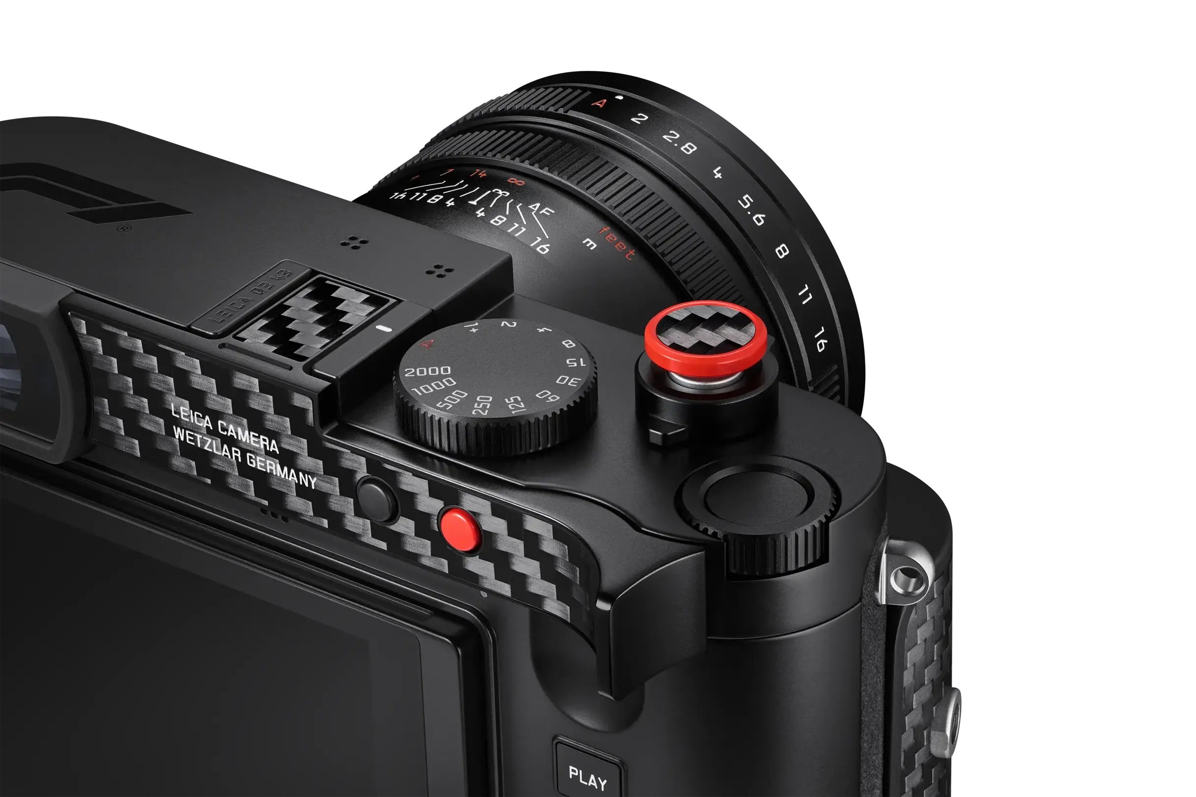 Top view of the Leica Q3 43 Formula 1 Edition showing the F1 engraving, carbon-fibre thumb rest and red soft-release button.