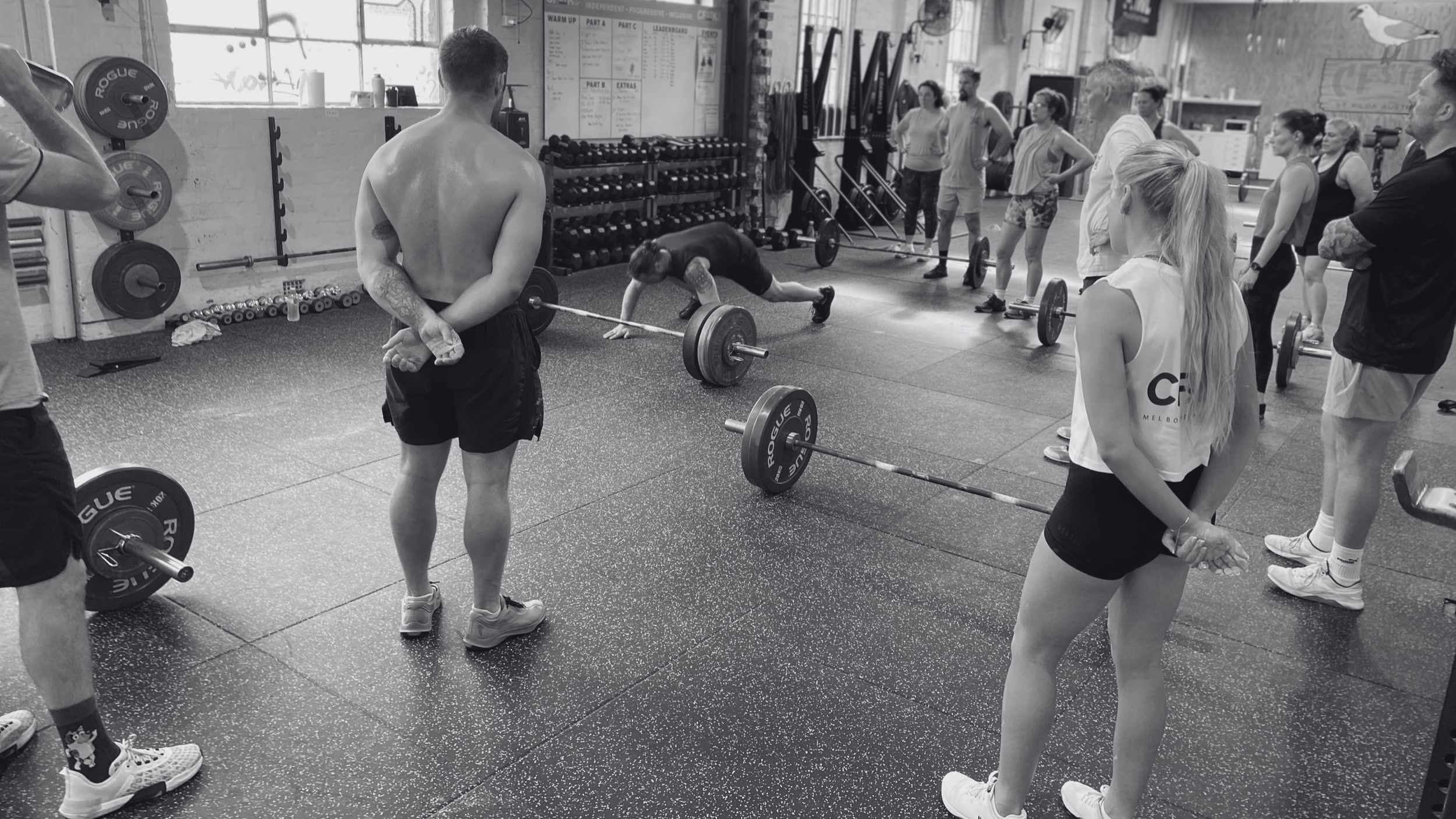 group pre workout whiteboard brief and demonstration by expert coach