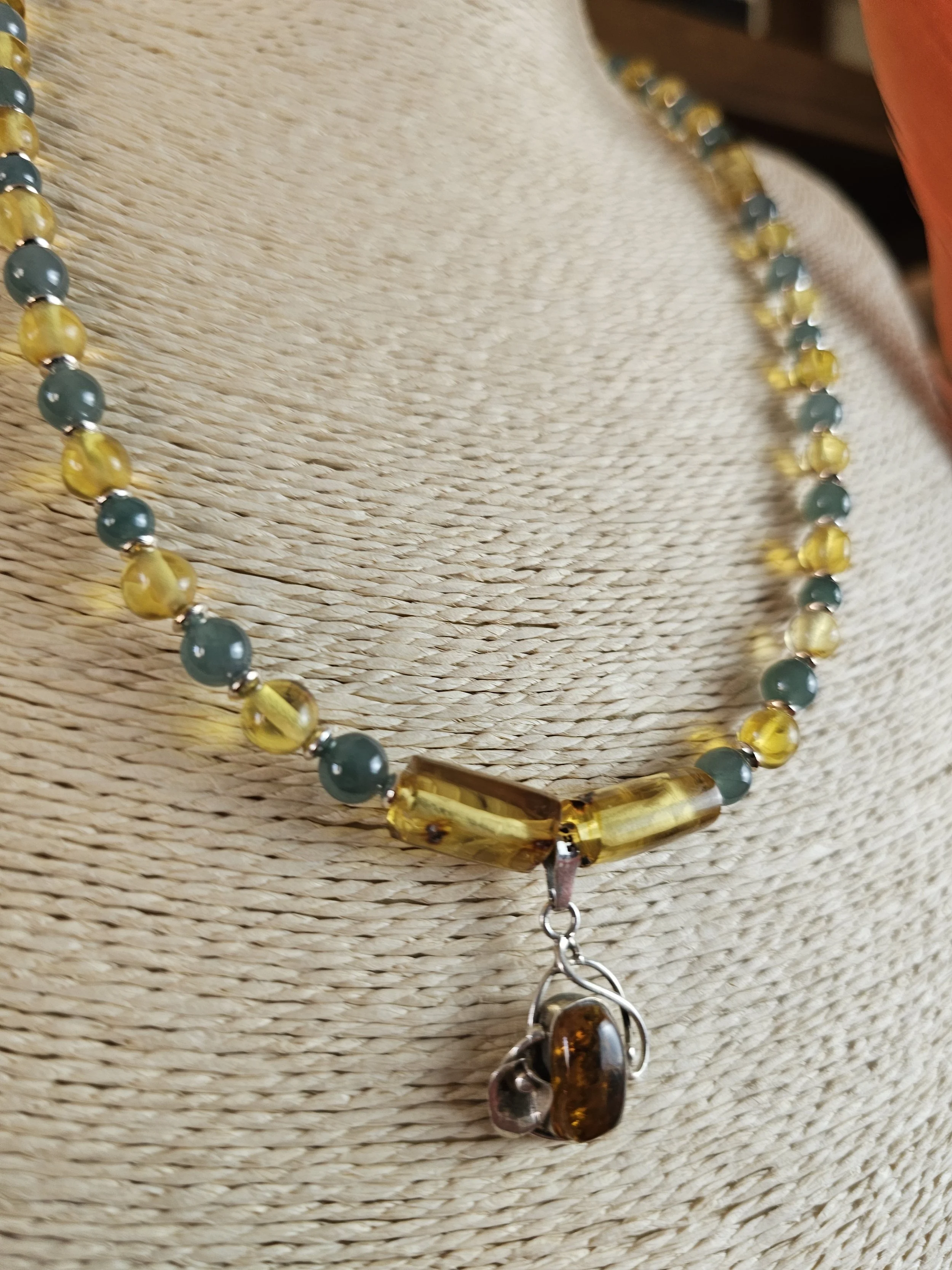 chiapas-amber-tube-dark-jade-bead-gold-sheen-obsidian-oval-pendant-necklace-detail_bhbpmd.jpg