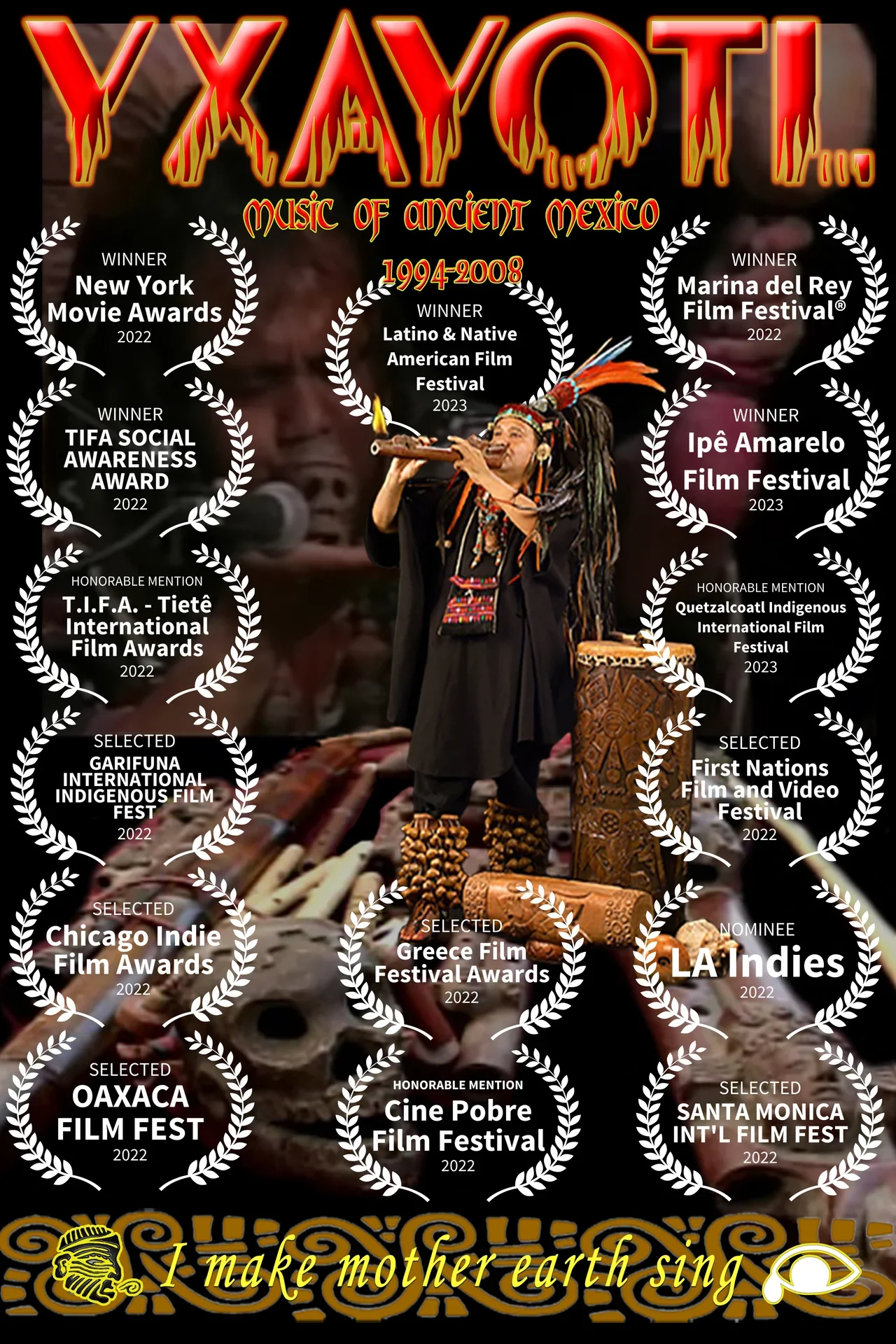Maestro Xavier Quijas Yxayot playing a traditional Mayan clay flute in the documentary Yxayotl music of Ancient Mexico.  surrounded by various awards and film festival nominations related to indigenous prehispanic music