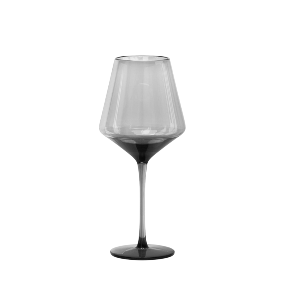A glass of red wine in a wine glass with a black stem, set against a plain white background.