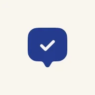 blue icon of a speech bubble with a checkmark in the middle