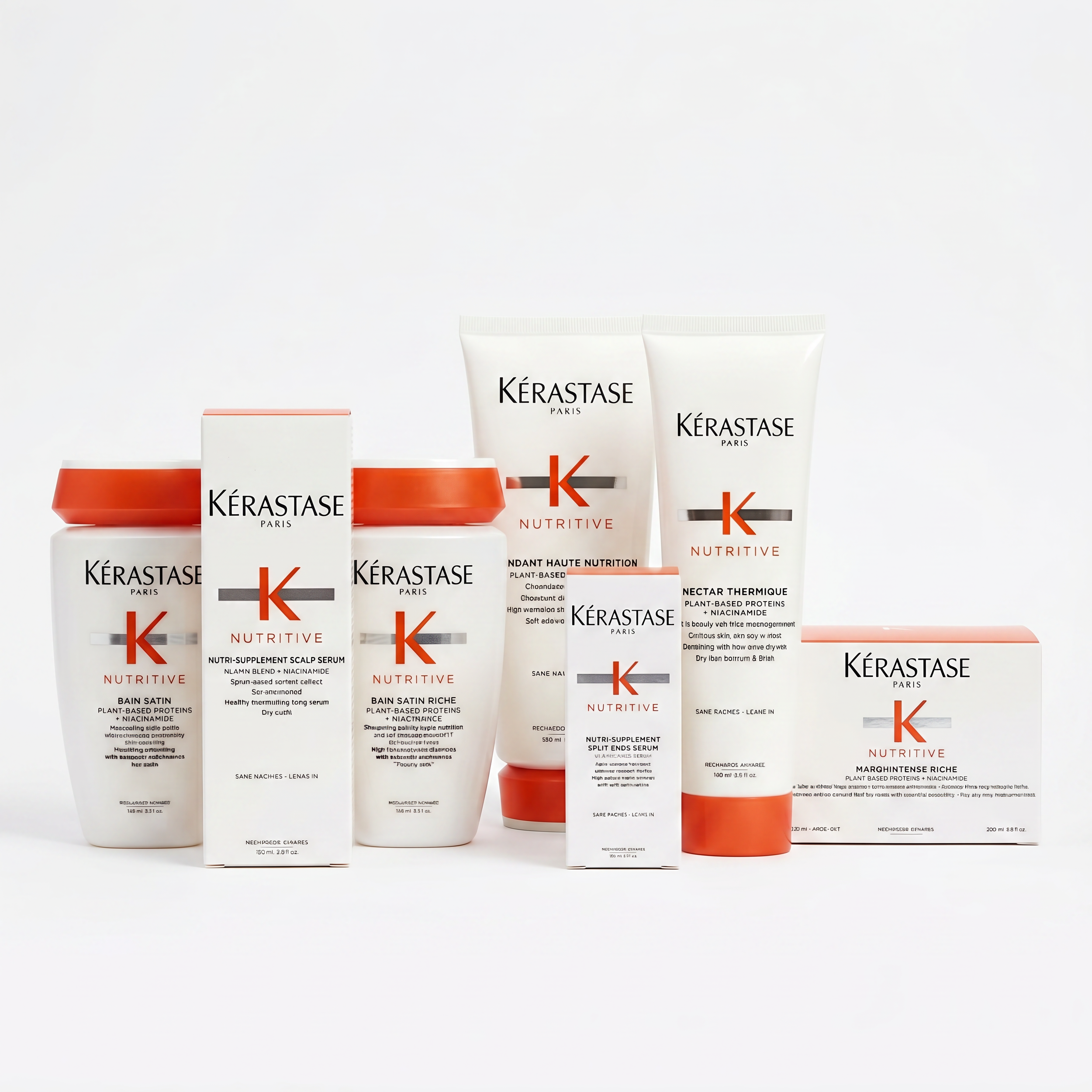Several skincare products from Kérastase Paris, including shampoos, conditioners, and serums, arranged against a white background.