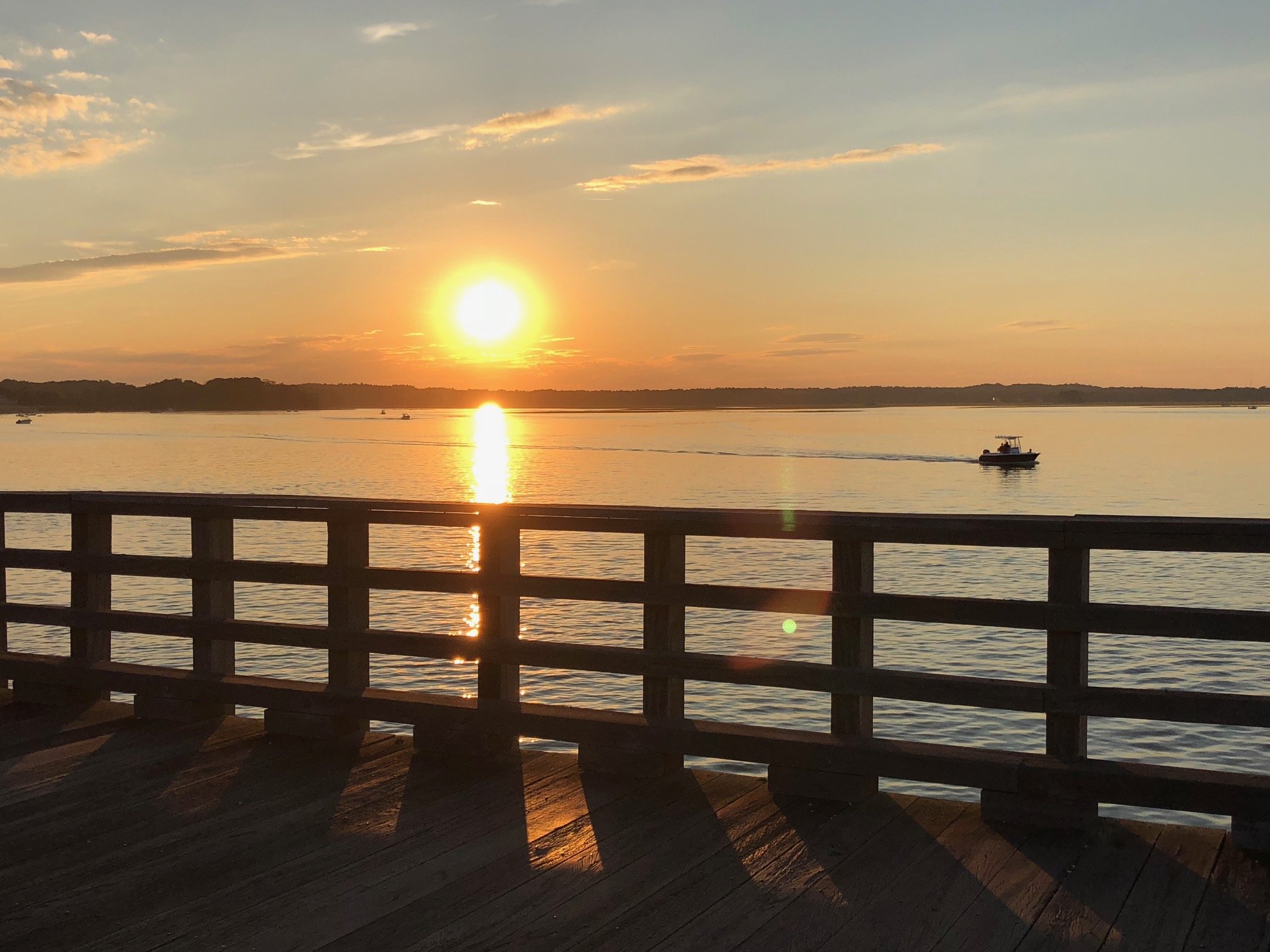 Bridge sunset w boat.jpeg
