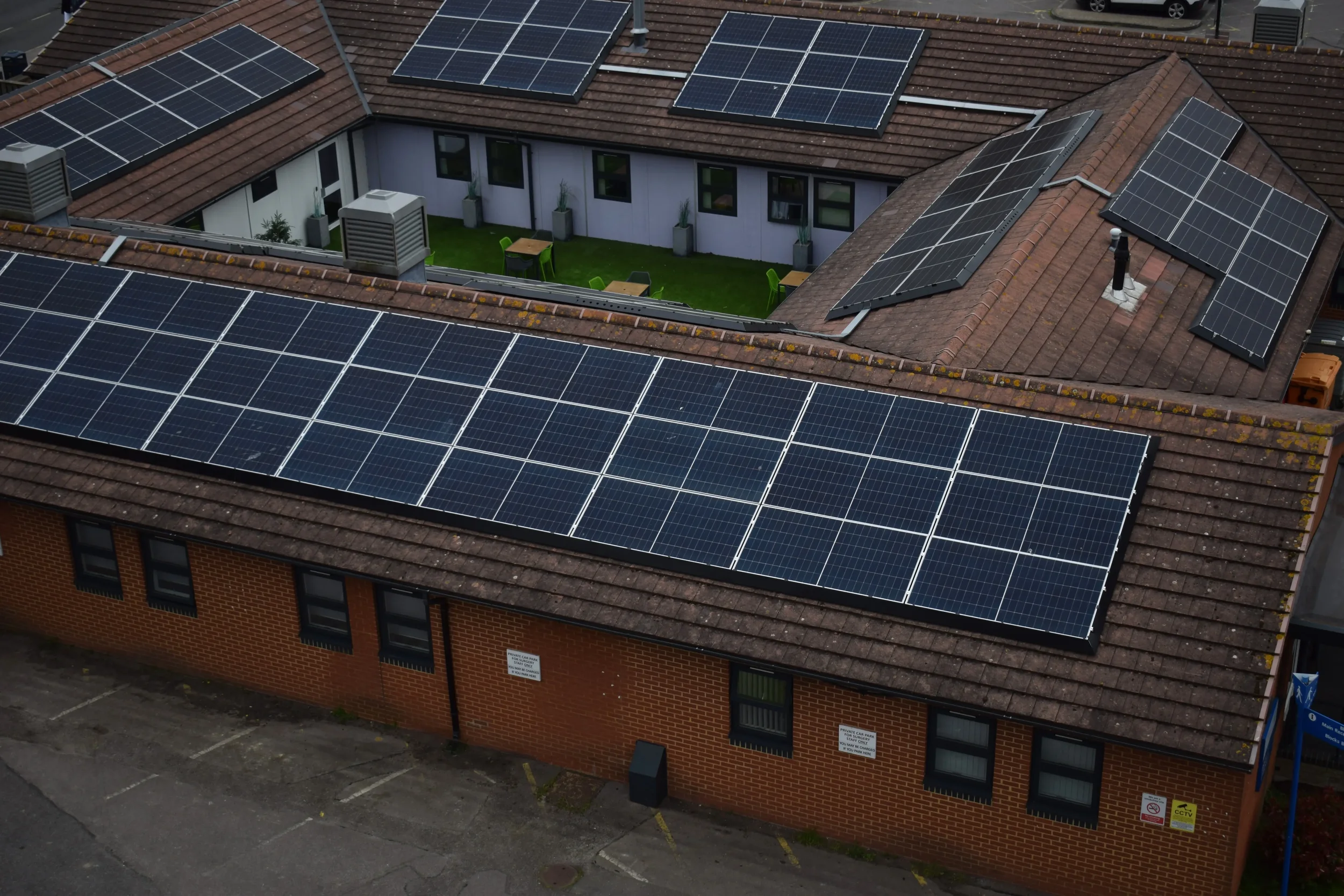 Commercial rooftop solar PV panels installed as part of a Salvis renewable energy project