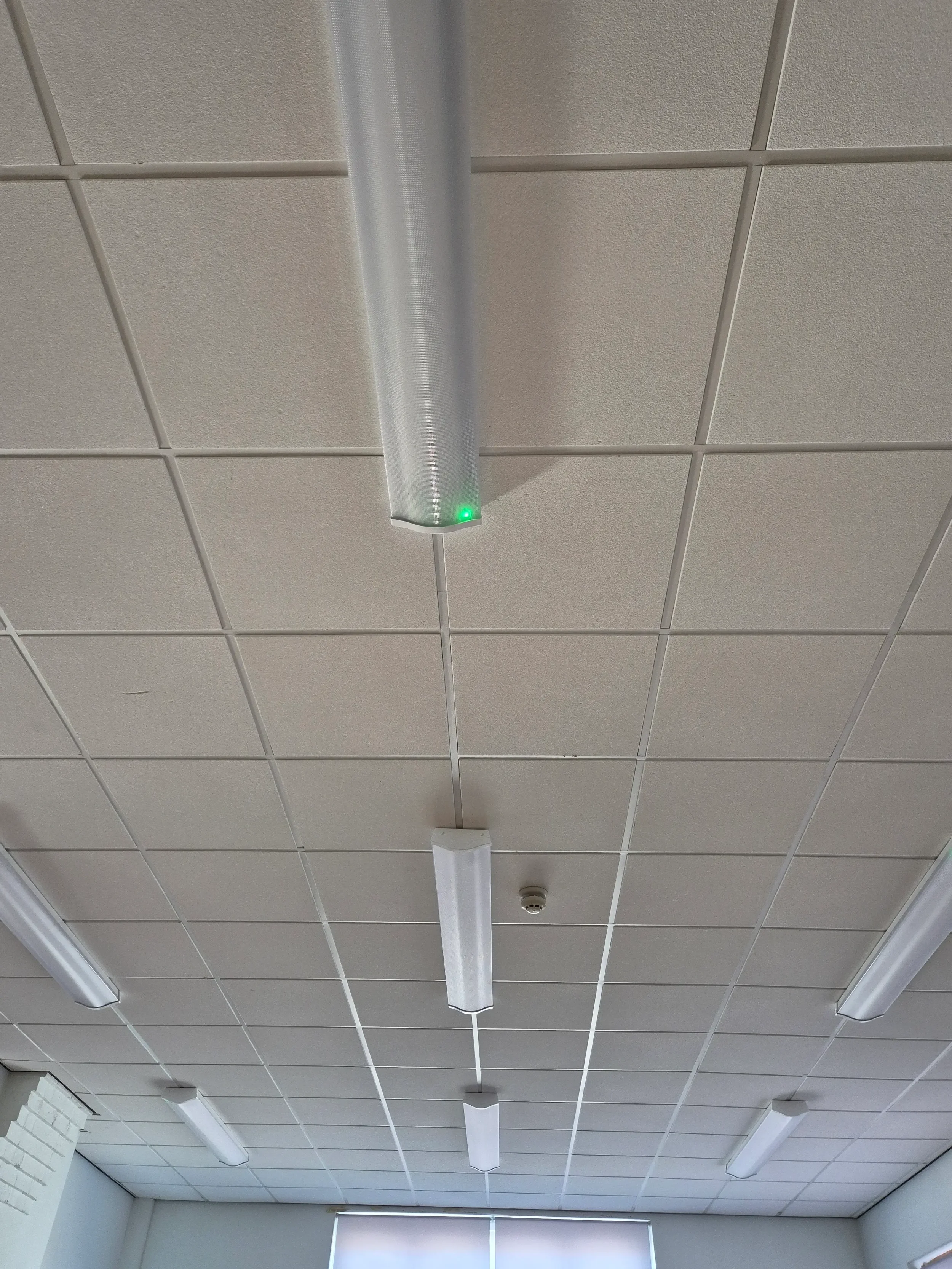 Fluorescent ceiling lighting assessed for LED replacement during a Salvis energy audit