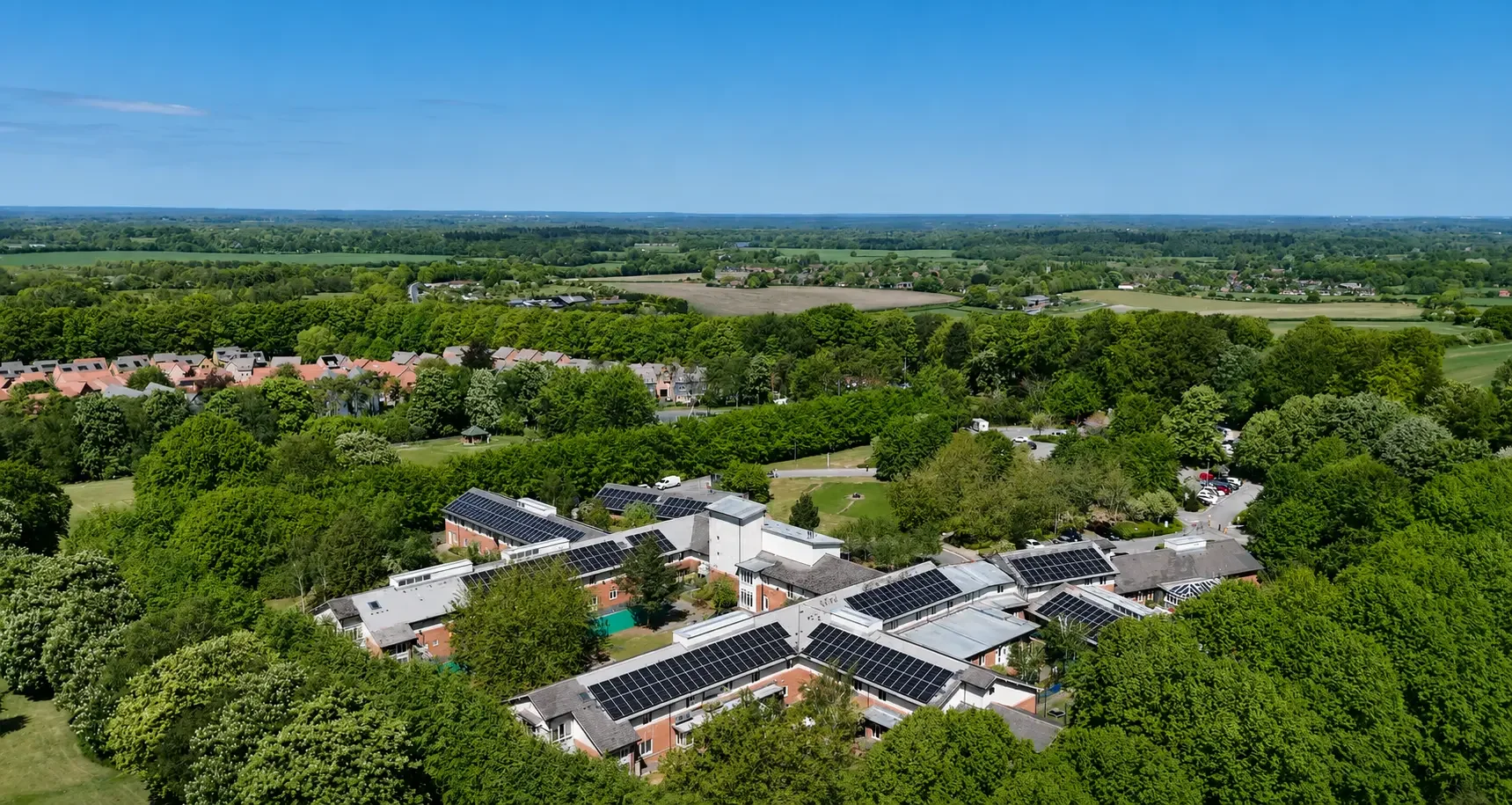 Aerial view of Parklands Hospital with rooftop solar PV panels from a Salvis renewable energy project