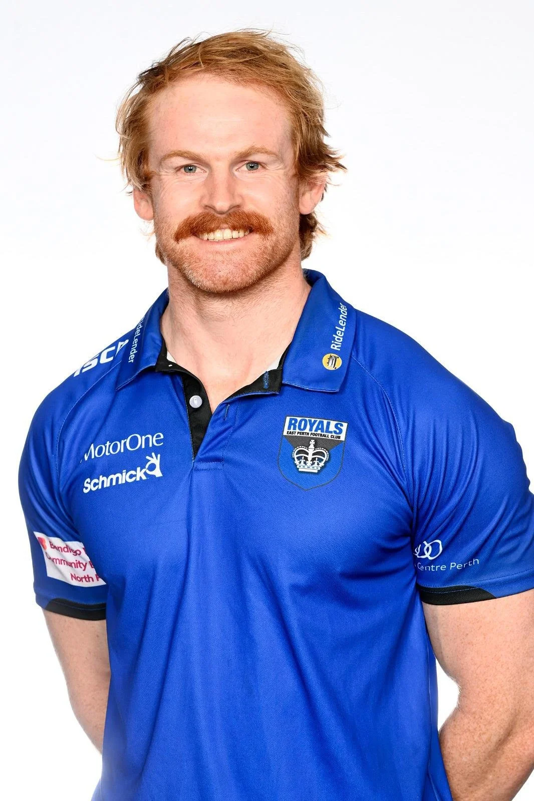 Osteopath Dr Ashby Smith - Owner of Apex Osteopathy Perth - Posing in a sporting collared shirt