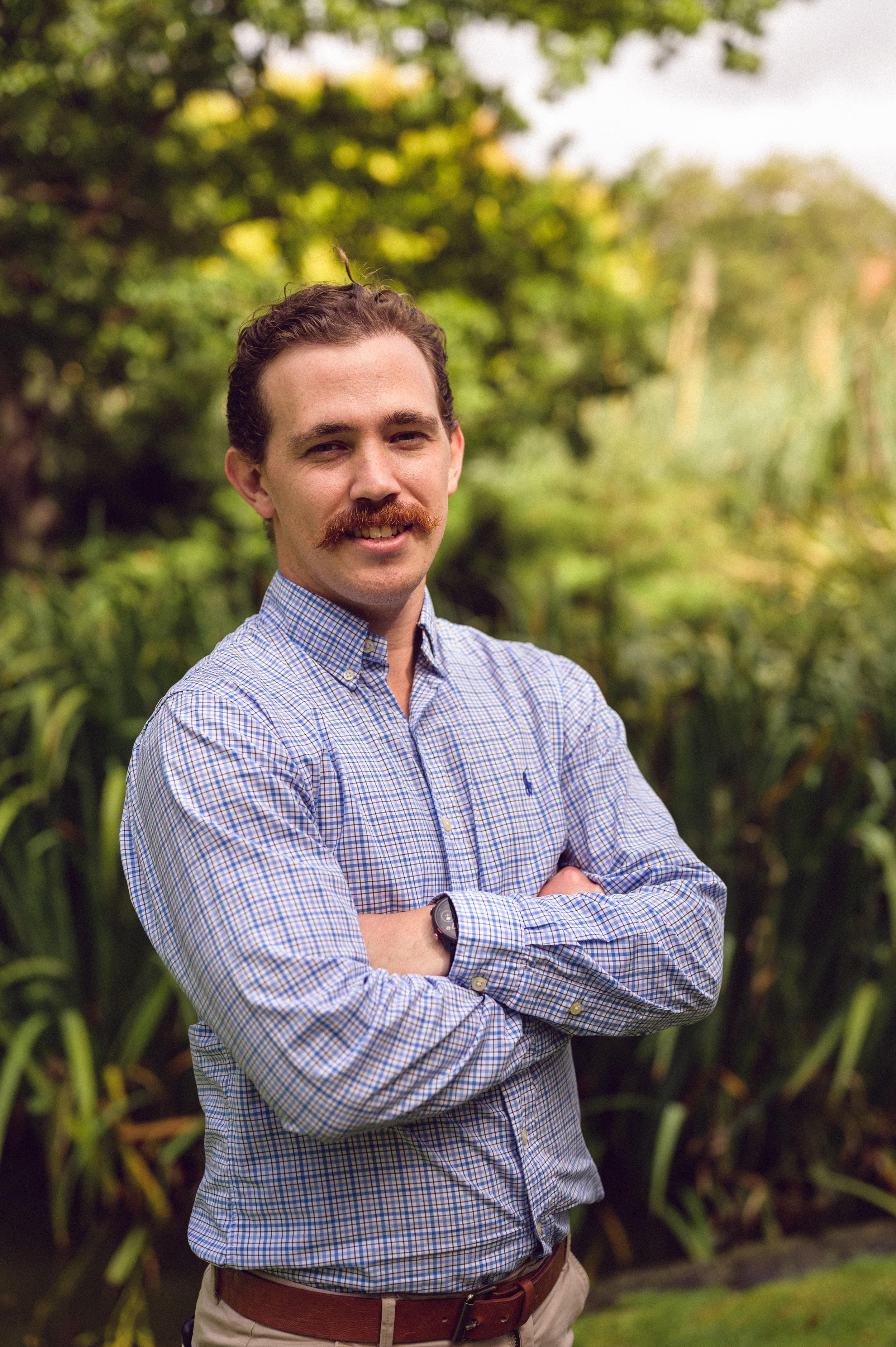 Sam Clavarino Allied Health and Clinic Management Specialist posing for a professional photo in a nice collared shirt.