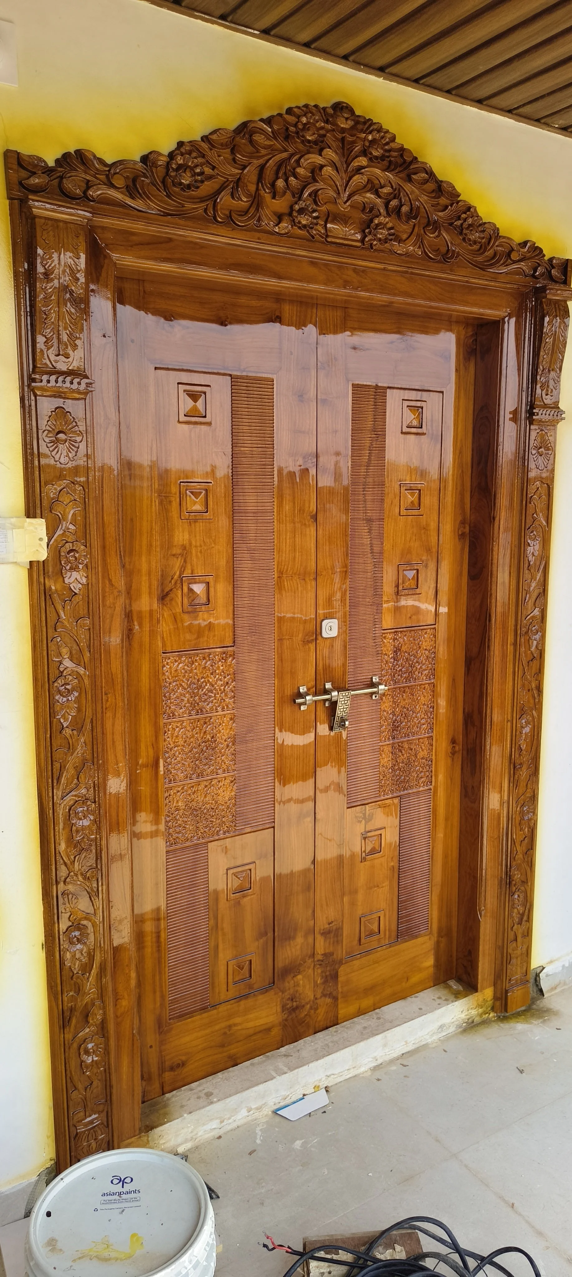 Latest designer main door and internal door designs in Khammam by Aakarshaa Interiors.