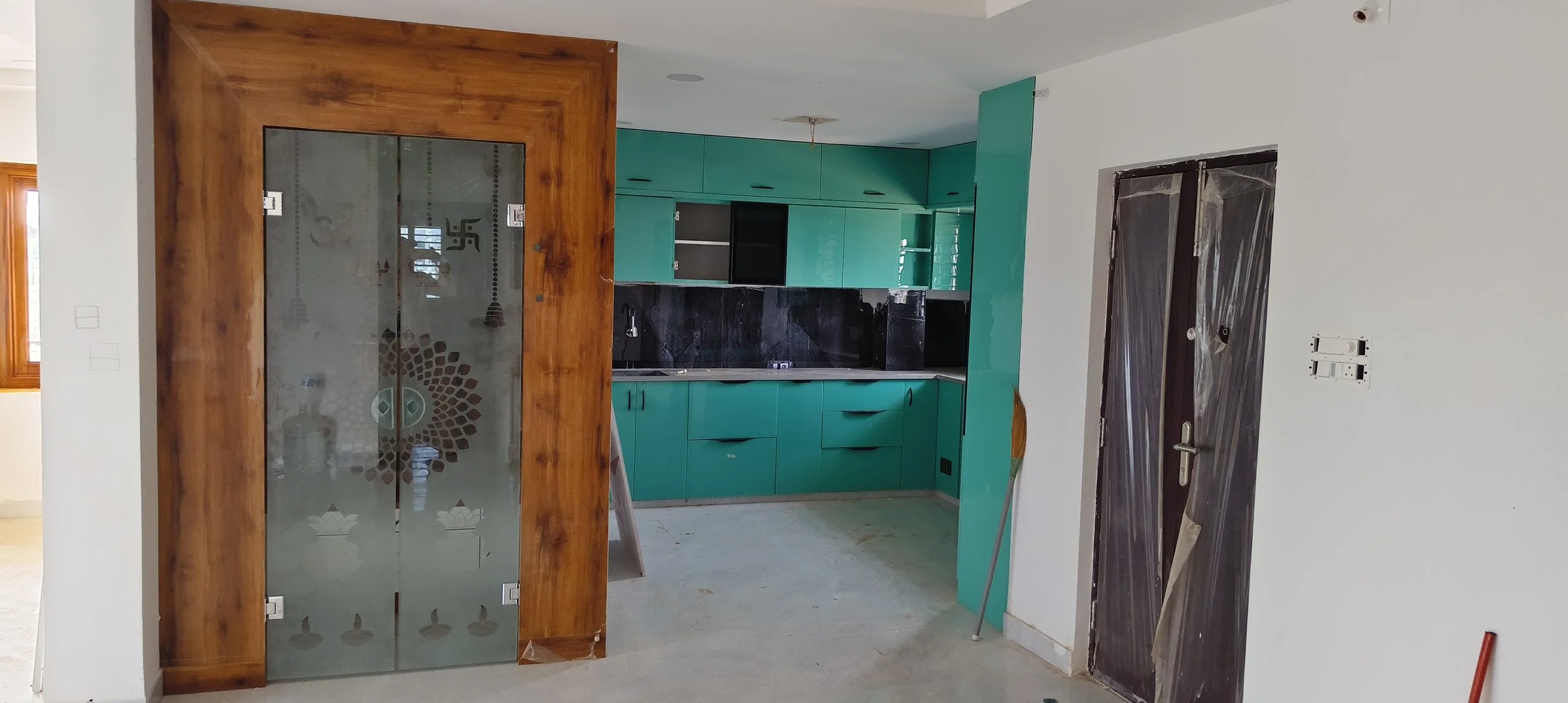 "Full residential interior transformation in Sri Nagar Colony, Khammam featuring modern modular furniture and premium finishes."