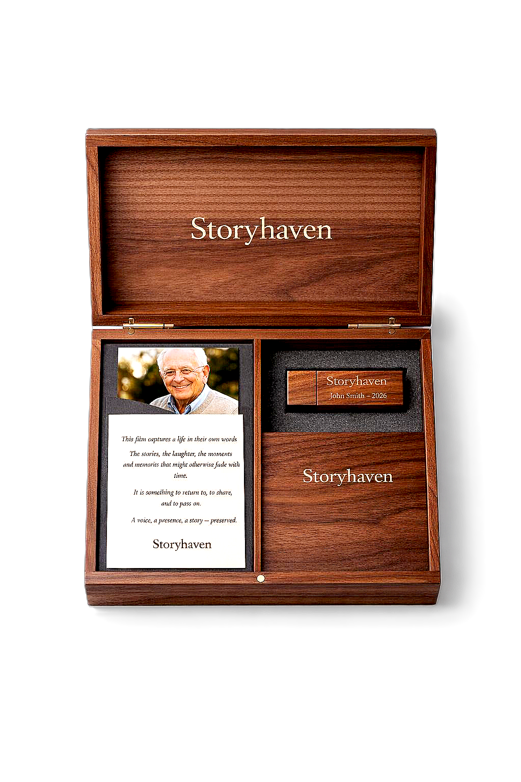 A wooden tribute box with 'Storyhaven' inscribed inside the lid. Inside, it contains a photograph of an elderly man, a memory card with 'John Smith - 2026,' a written note, and a wooden block with 'Storyhaven' engraved, all set against a black background.