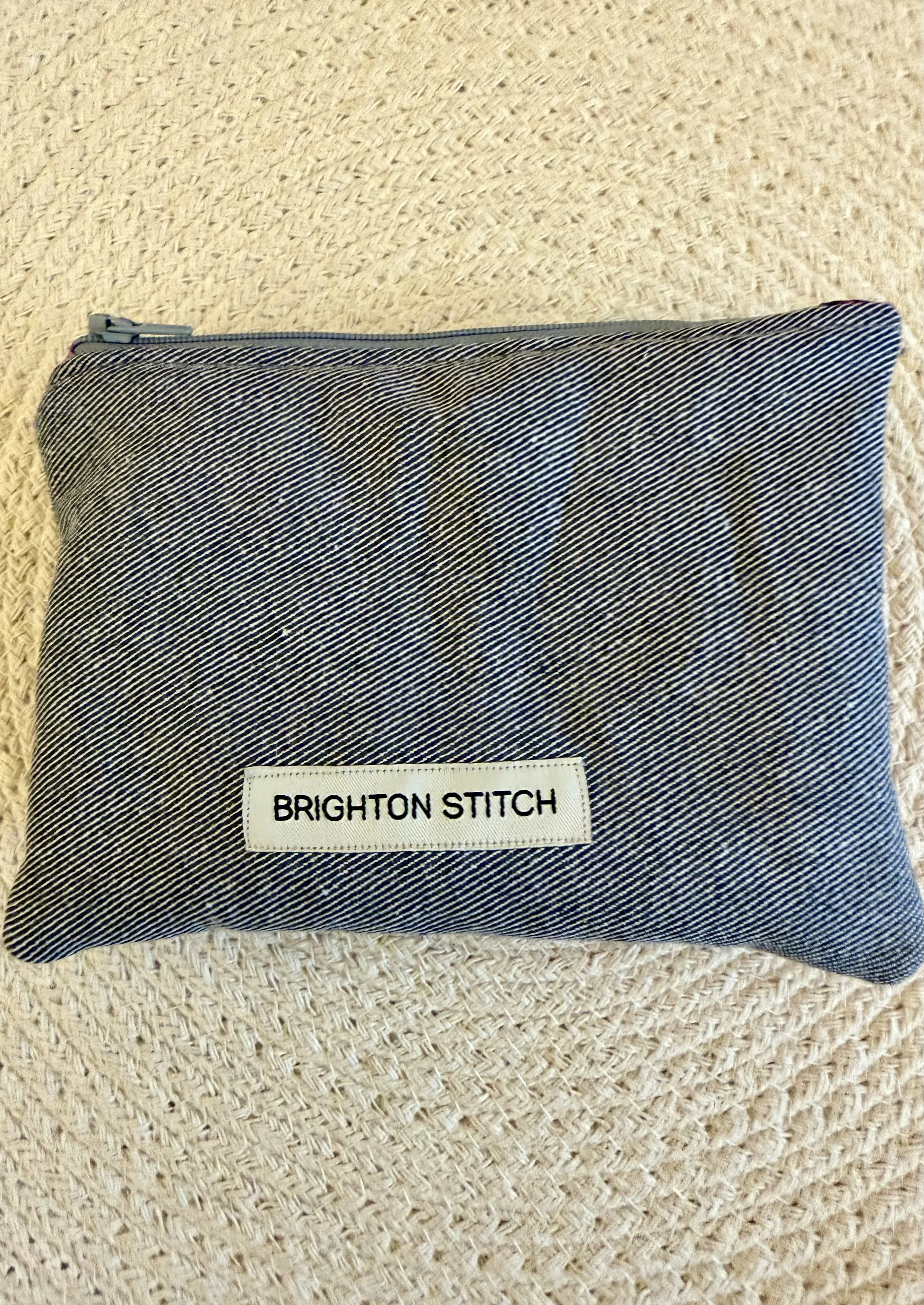 Reclaimed blue denim back of Berry and Clementine pouch with Brighton Stitch label