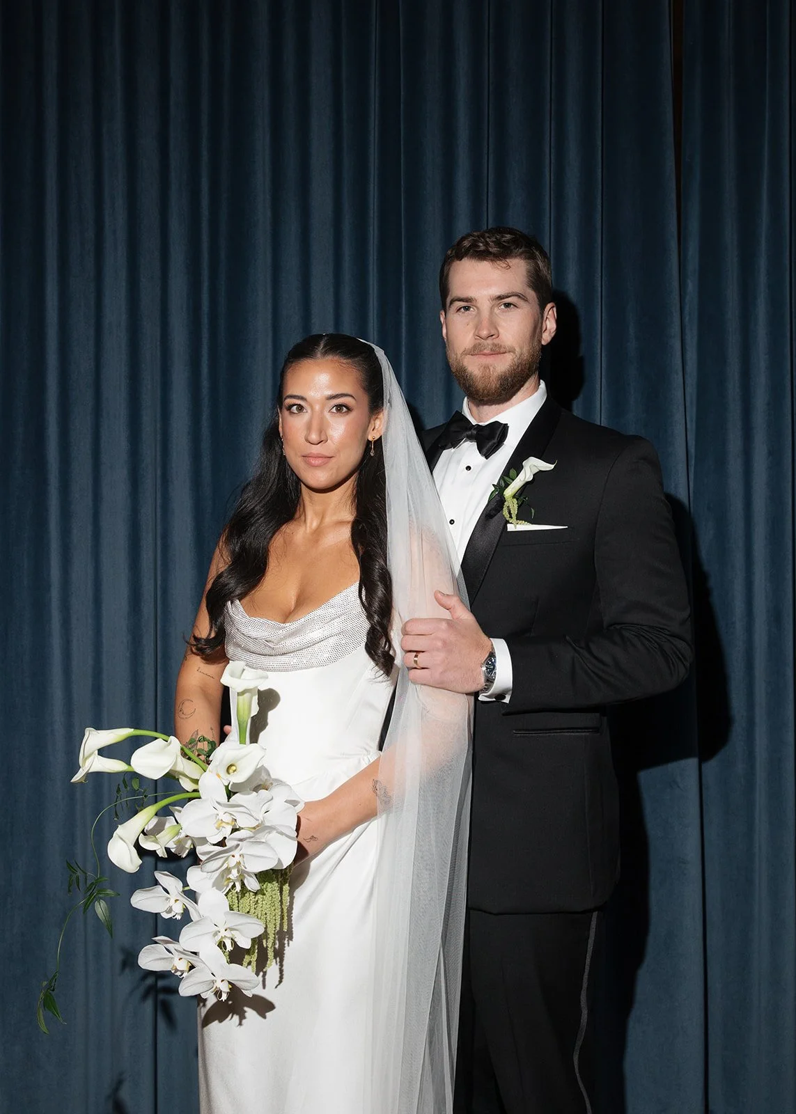 chic white and green hotel kc fall wedding in downtown kansas city the cottage rose full service wedding florist calla lilies orchids amaranth bridal bouquet groom