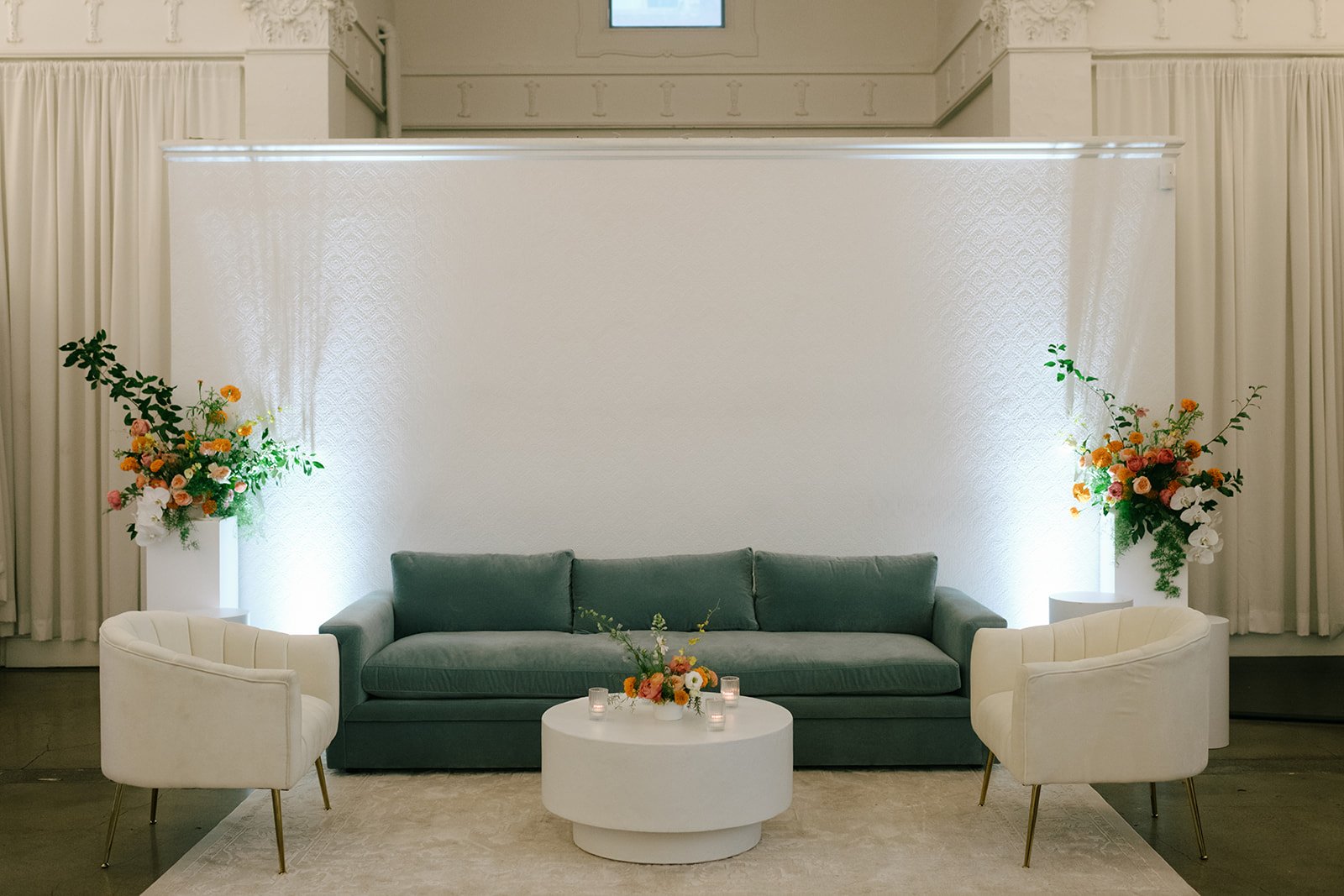 colorful fall wedding at la villa midtown kansas city the cottage rose full service wedding florist crossroads orchid ceremony hanging archway flowers marigolds modern florals lounge furniture florals