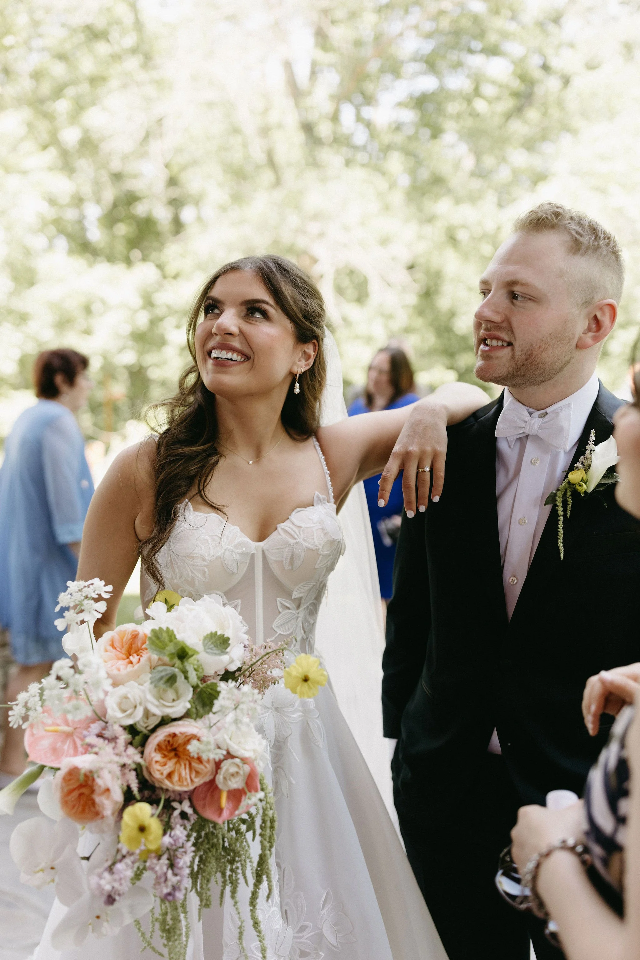 modern spring garden wedding in May ceremony at Powell Gardens reception in union crossroads kansas city floral column installation bridal bouquet amaranth calla lilies the cottage rose wedding florist large statement wedding bouquet