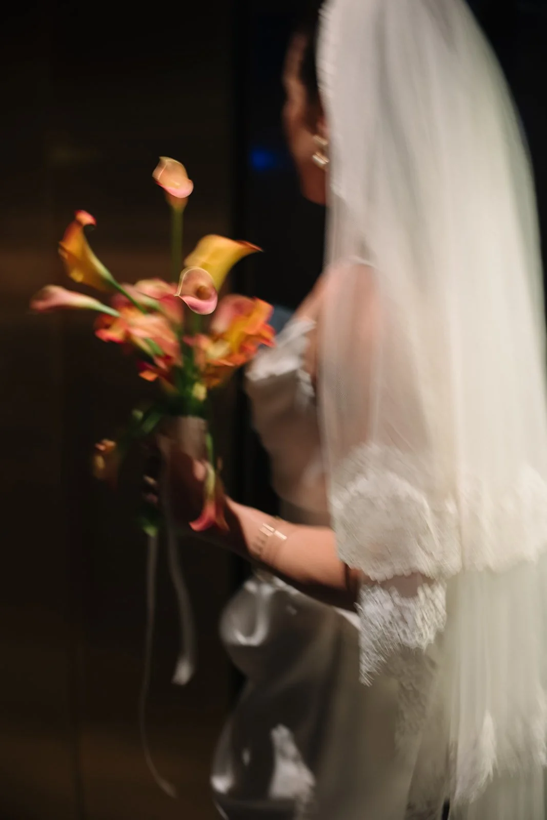 September wedding at Hotel Kansas City mango calla lilies marigolds craspedia the cottage rose full service wedding florist crossroads modern wedding flowers bridal bouquet
