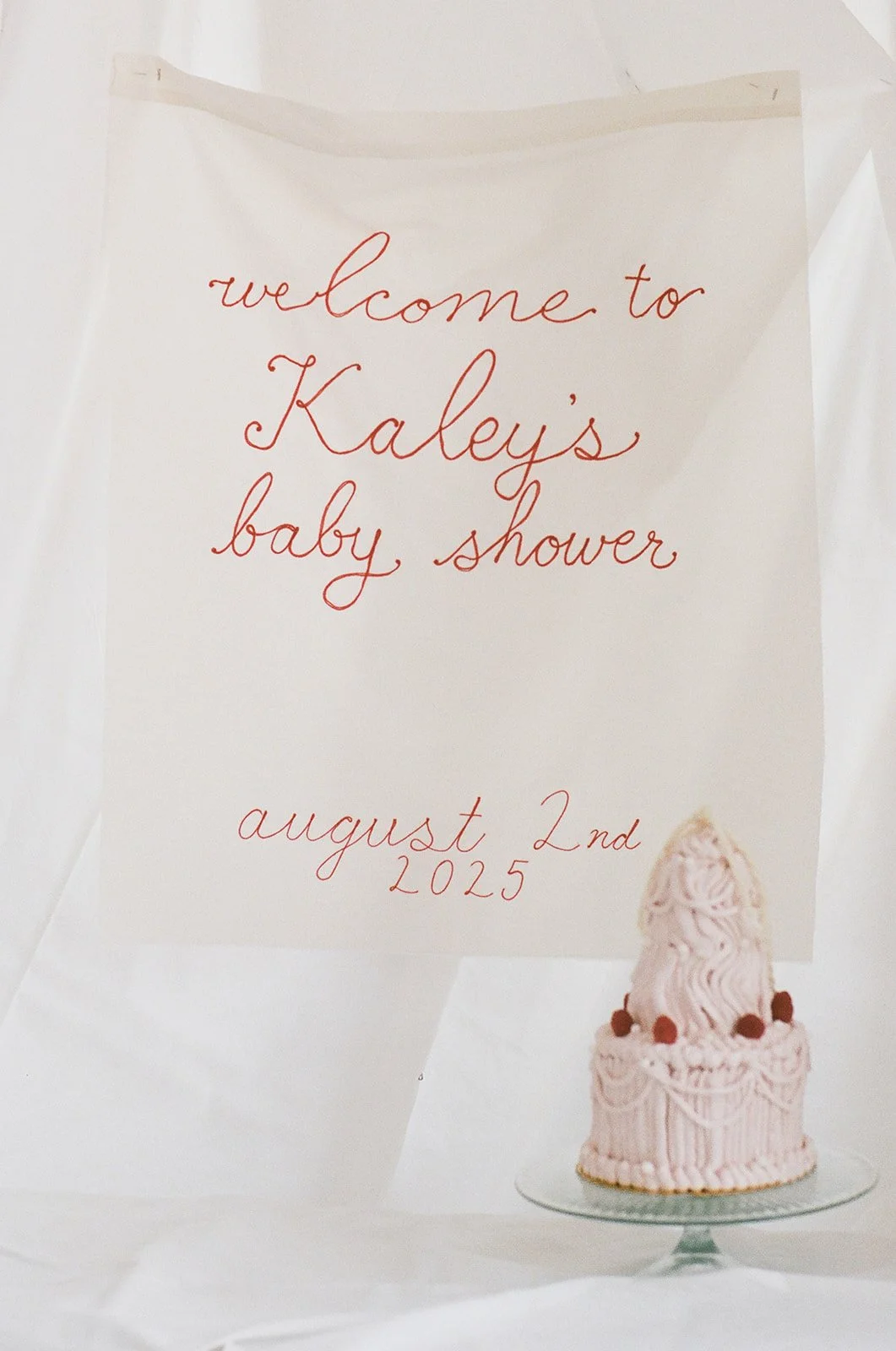 chic editorial baby shower with draped fabric hanging calla lilies minimal architectural centerpieces silver candlesticks the cottage rose full service wedding florist kansas city crossroads modern floral design cake