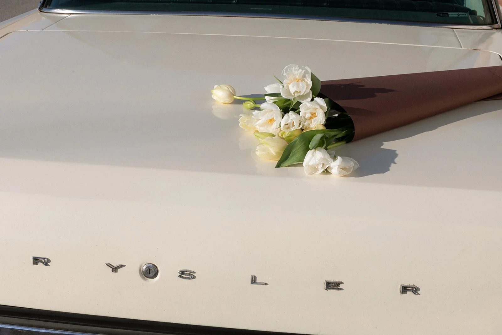editorial branding shoot flowers maggie routon interior design studio the cottage rose full service wedding florist kansas city crossroads vintage car tulips hydrangea flower arrangement