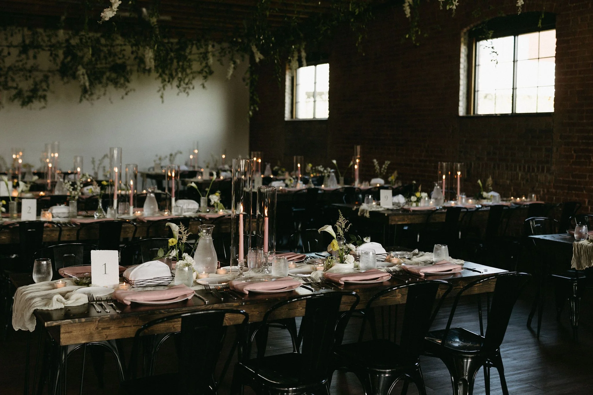 modern spring garden wedding in May ceremony at Powell Gardens reception in union crossroads kansas city floral column installation amaranth calla lilies the cottage rose wedding florist reception decor peonies lilac long table flowers hanging greens