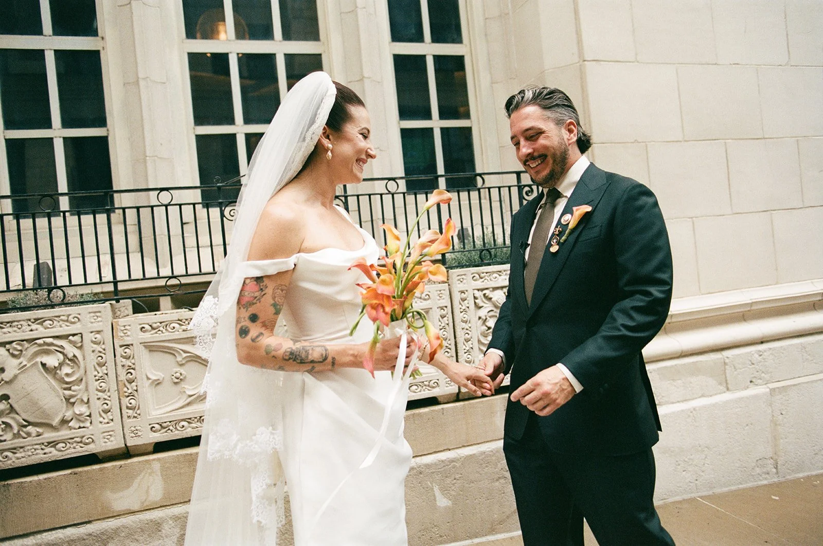 September wedding at Hotel Kansas City mango calla lilies marigolds craspedia the cottage rose full service wedding florist crossroads modern wedding flowers bridal bouquet