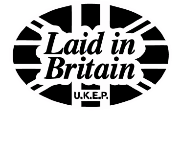 Black and white logo featuring the text "Laid in Britain" with the tagline "Quality Assured" below.