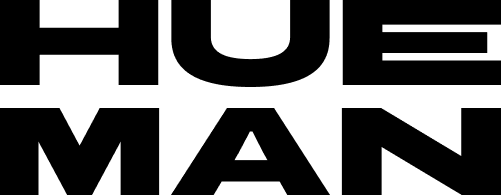 A laptop keyboard with a document and a smartphone on top, viewed from above.