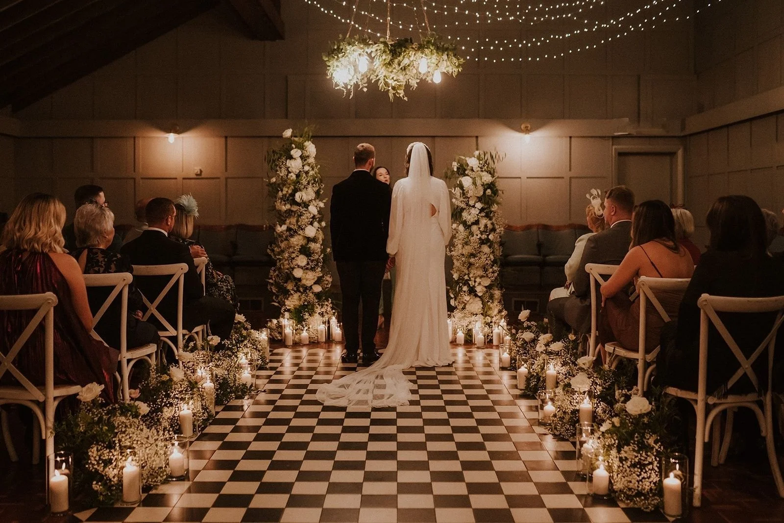 white rose gypsophila wedding broken arch