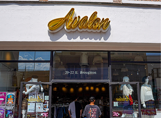 Storefront with gold 'Avalon' sign and mannequins outside, located at 20-22 E. Broughton.