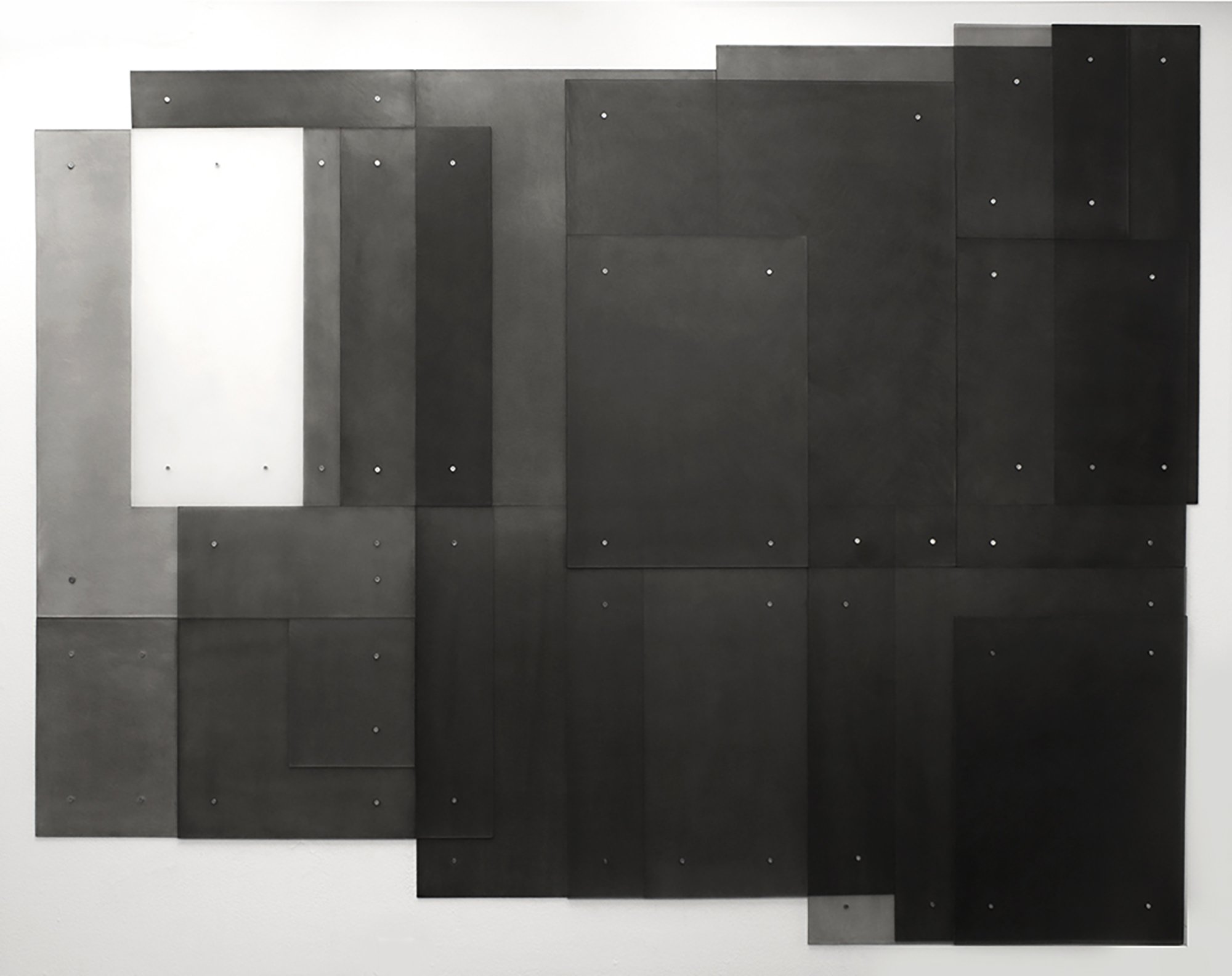 Displacing the Air, 2017, black India ink painted onto sanded plexiglass, 23 individual pieces of varying size, total dimension, 76” x 93”