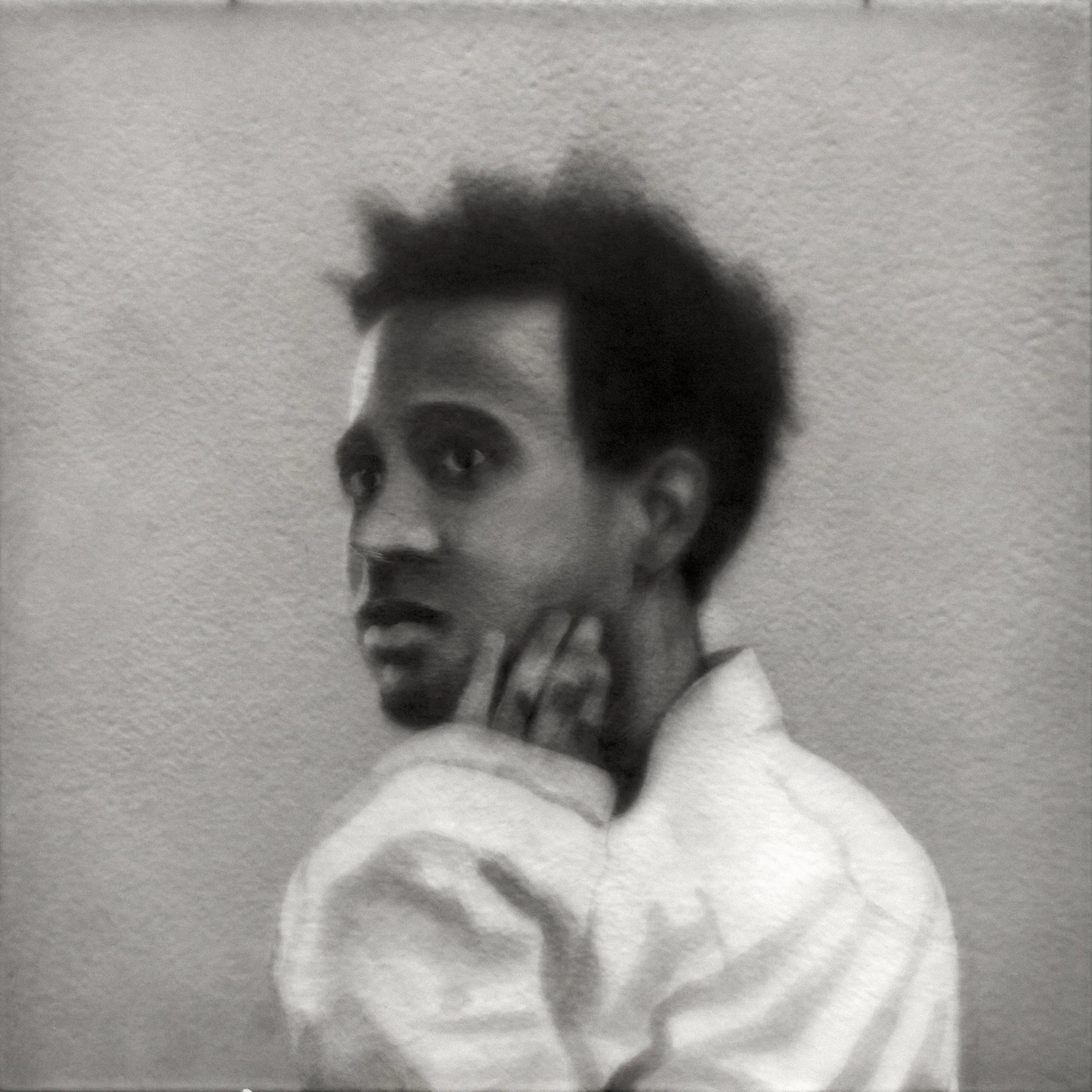 Young Man, 2016-2018, black India ink painted onto sanded plexiglass, 12” x 12”