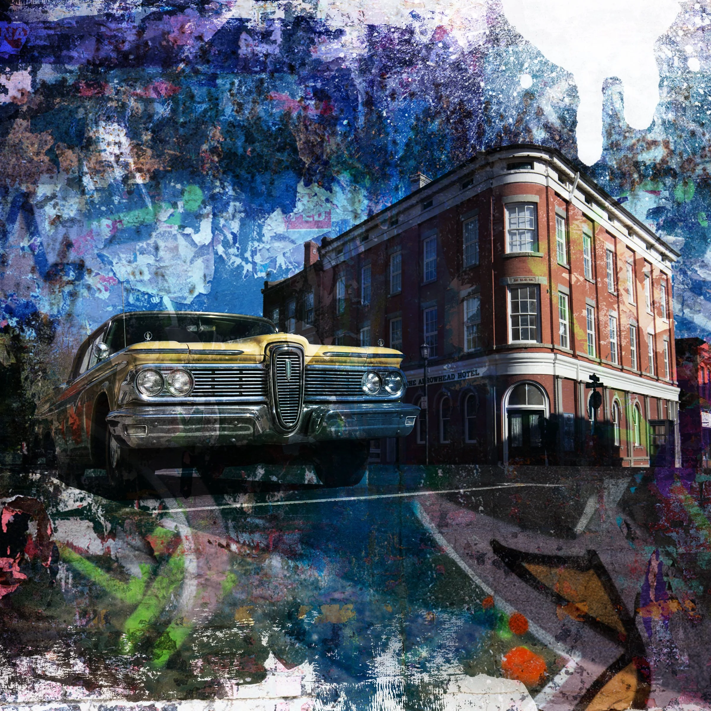 A vintage car parked on a street in front of a brick building, with colorful abstract overlays and textures in the sky and foreground.