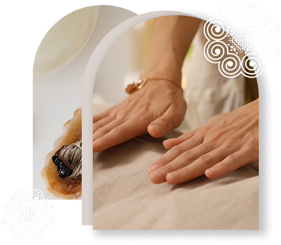 Hands receiving a massage on a massage table