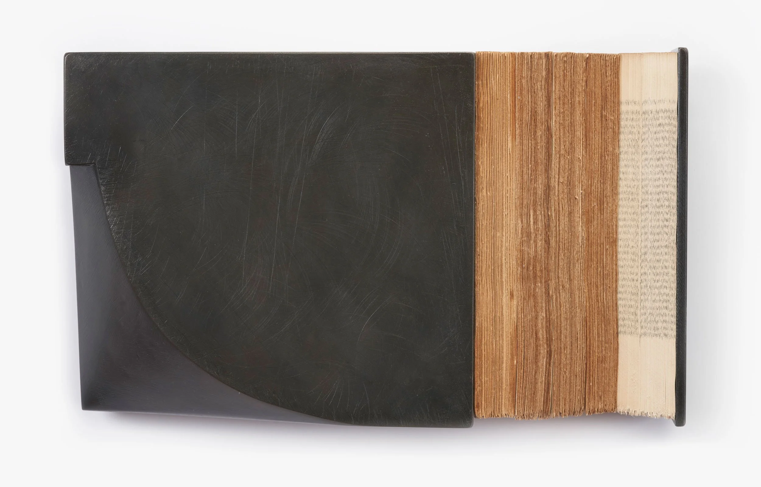 Andrew Hayes 
 Crest  
15 x 9 x 4 inches 
Fabricated steel and book paper 
2025