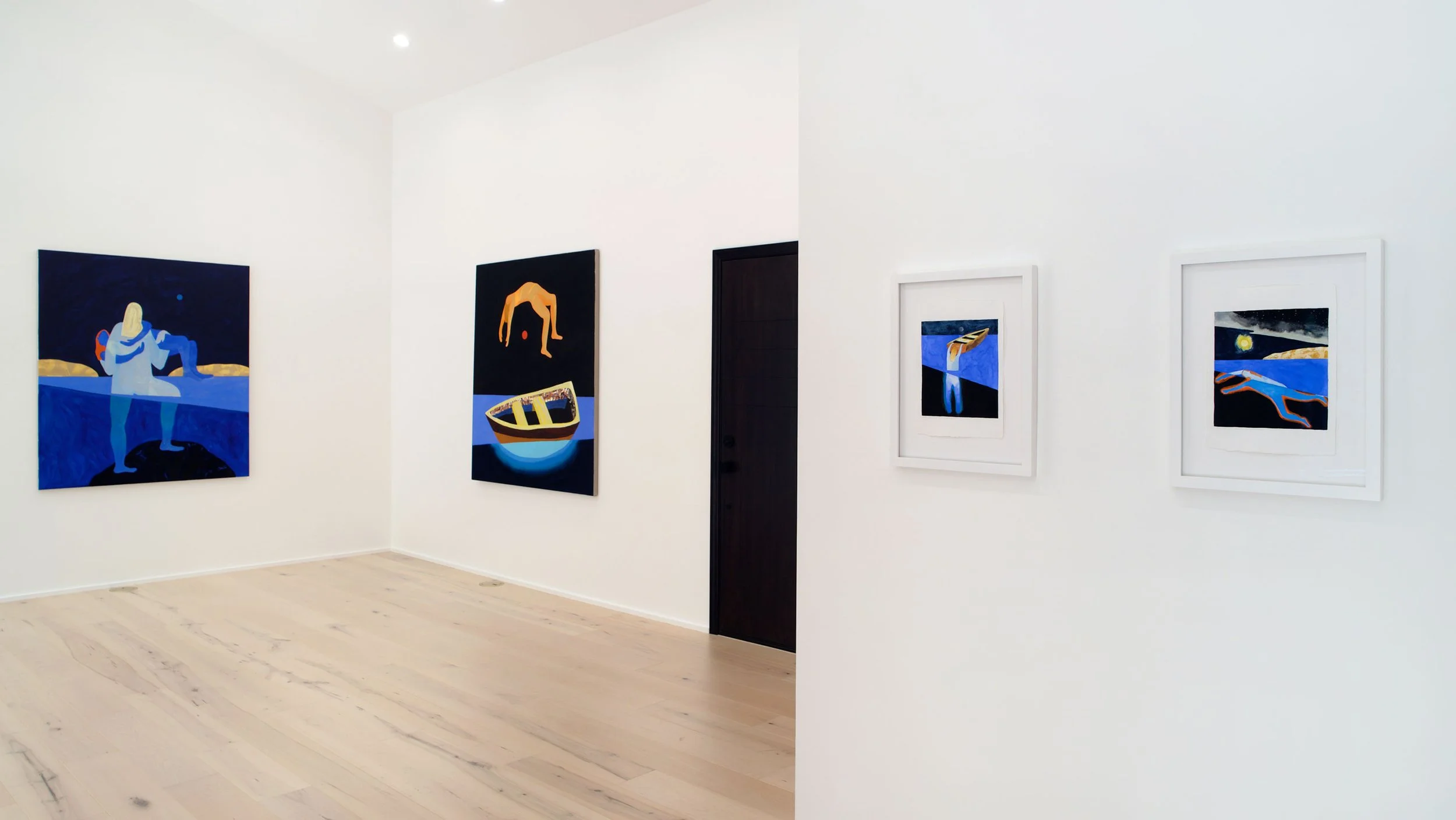 Art gallery with four colorful paintings on white walls, depicting stylized human figures and landscapes, with a light wooden floor.