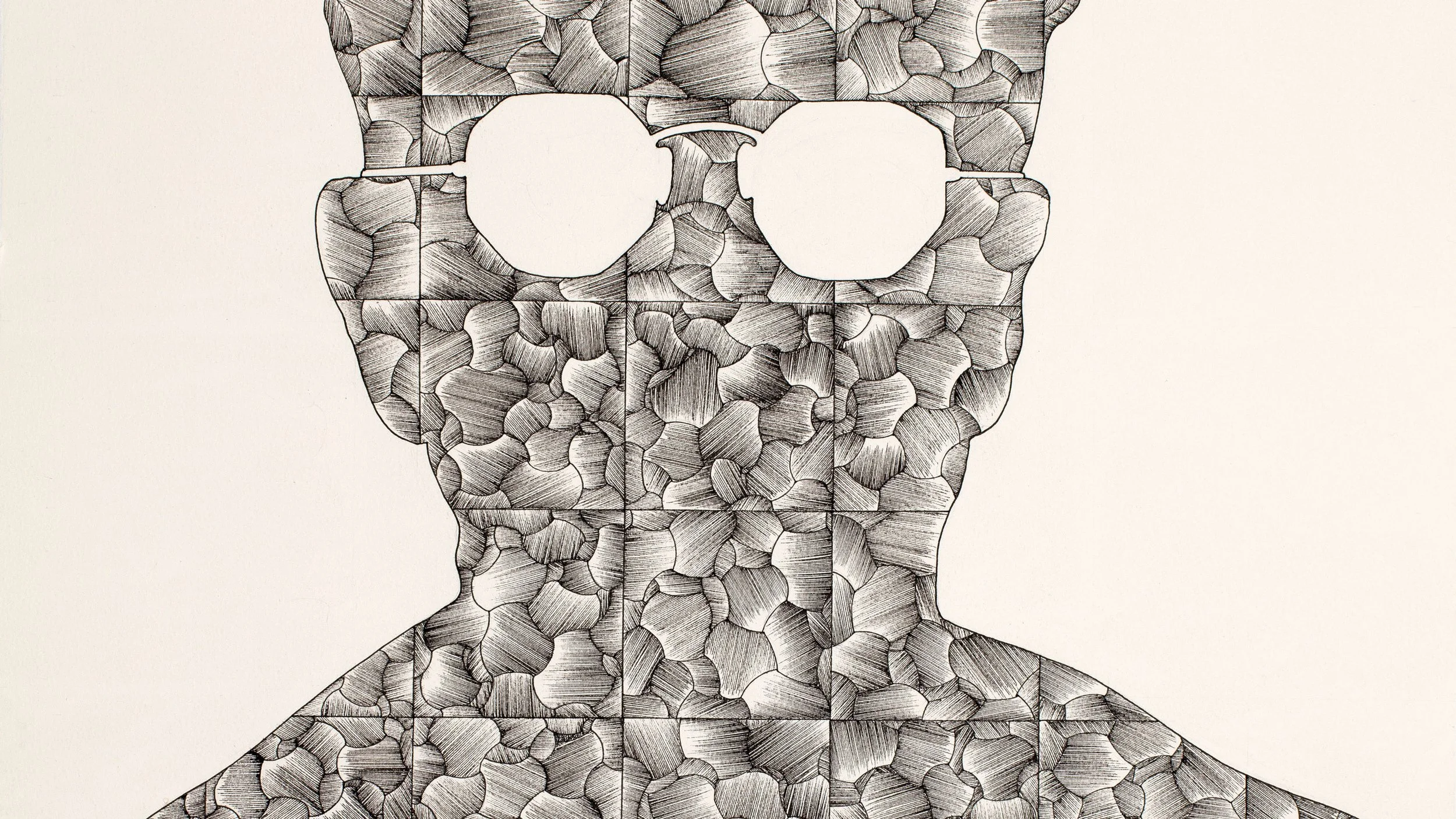 A piece of graph paper with a pattern of diamond shapes stitched in red and blue thread.