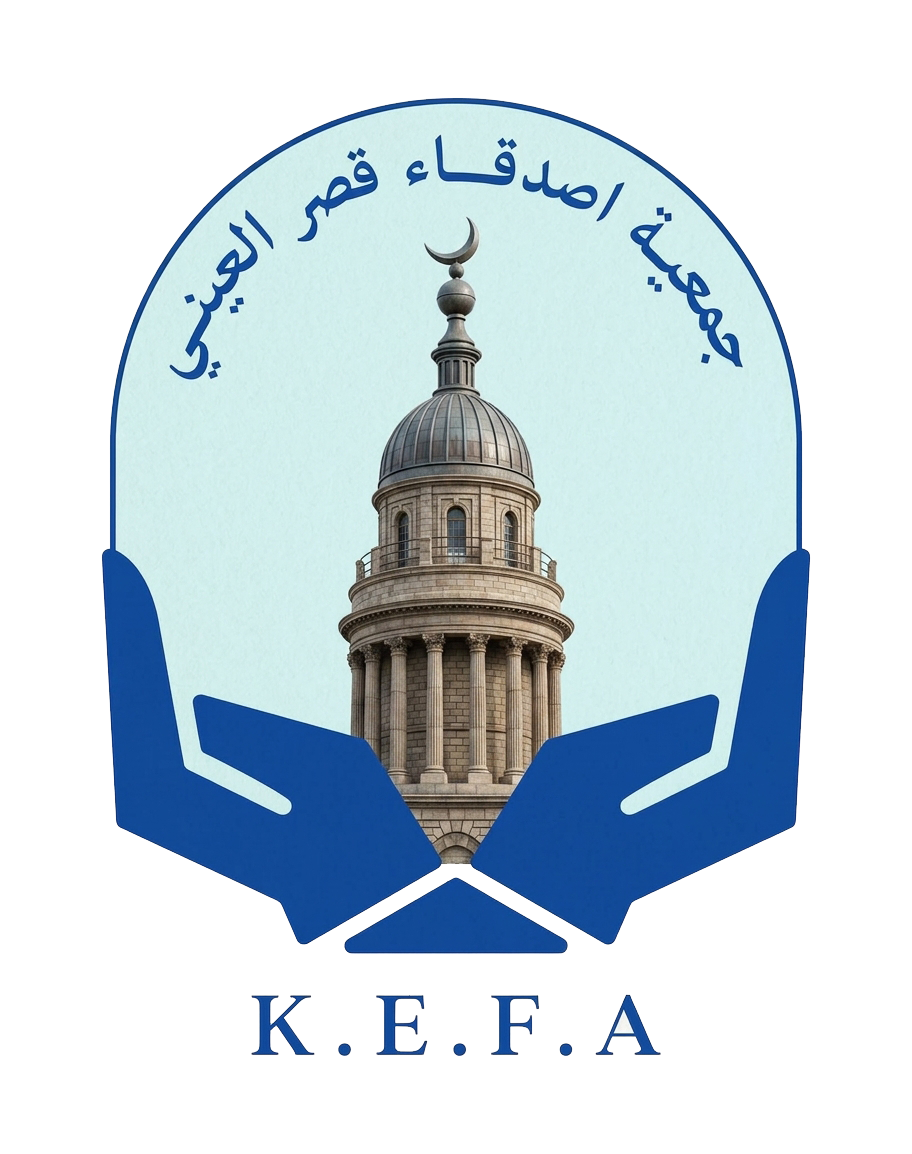 Logo of the Union of KEFA foundation, featuring a pair of blue hands holding a building with a dome and a crescent moon on top, with Arabic text and the acronym K.E.F.A. at the bottom.