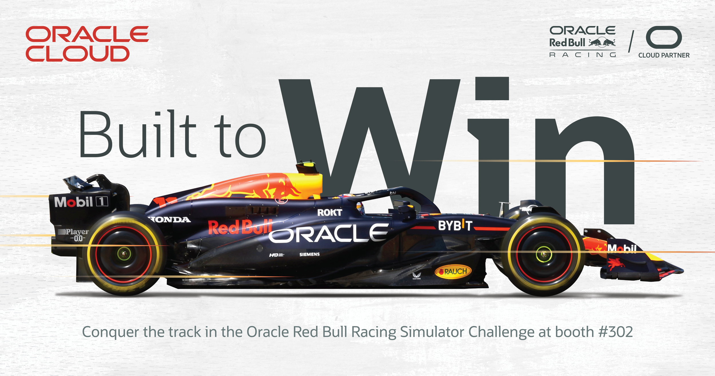 A racing car with the Red Bull Racing team livery, prominently displaying sponsor logos such as Oracle, Mobil 1, Honda, and Rauch, on a simulated track with the text 'Built to Win' in the background. The image promotes the Oracle Red Bull Racing Simulator Challenge at booth #302.