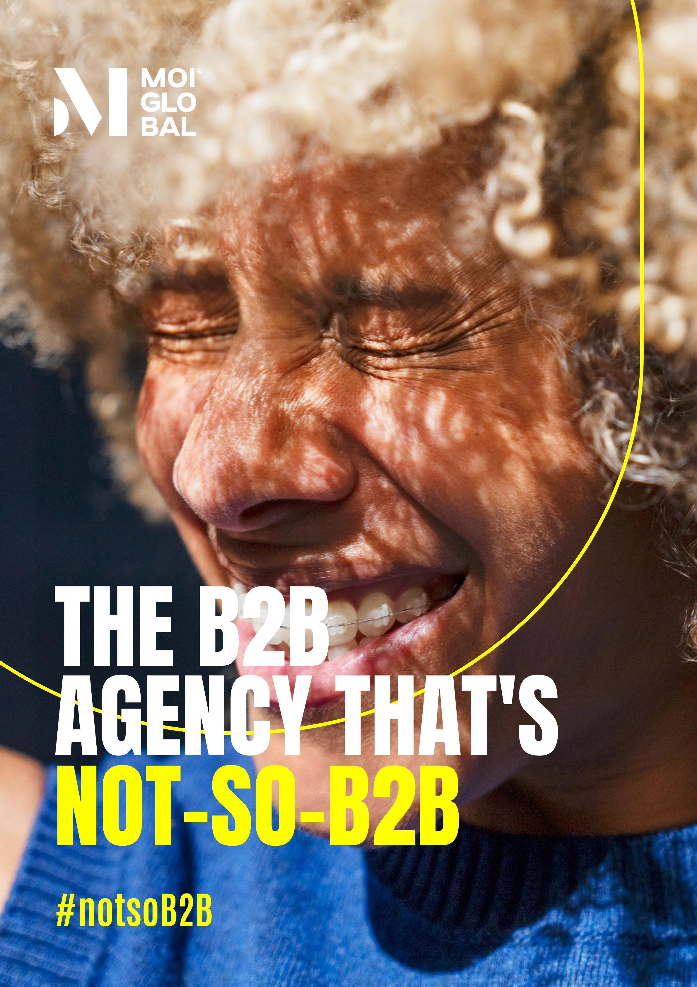 Close-up of a smiling person with curly hair. Overlaid text reads: "The B2B Agency That's Not So B2B" and has hashtags #notsoB2B at the bottom.