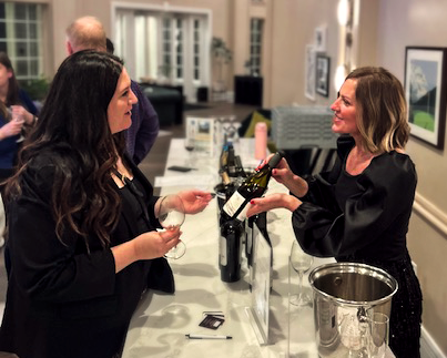 Rachael Harcourt presenting wines at a K&N Wine Company tasting